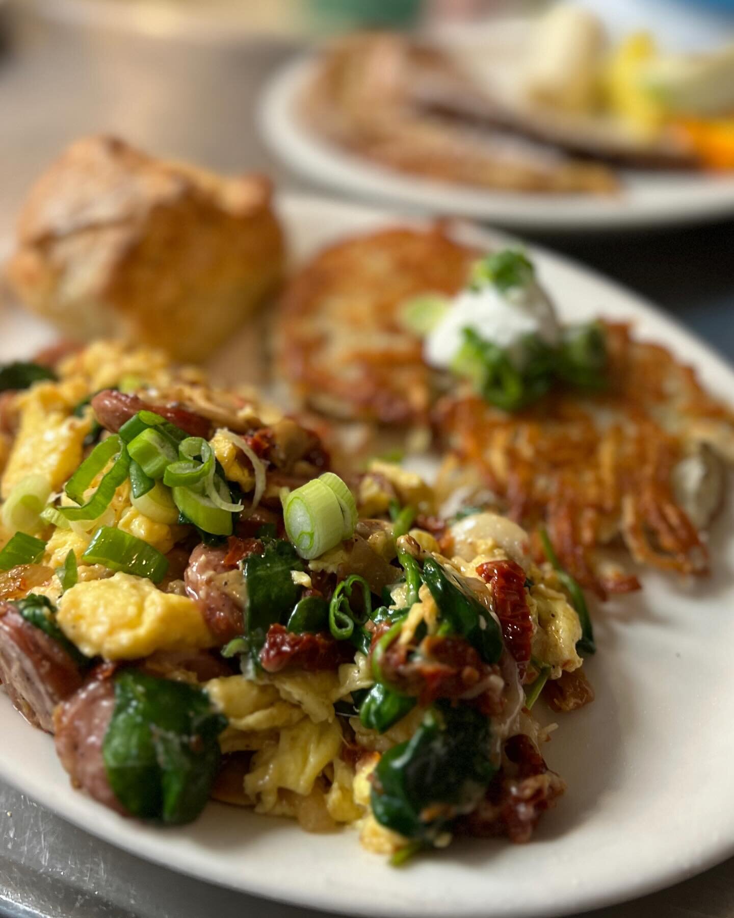 We have a super yummy special for you all today! Today we are featuring a two egg scramble with andouille special, onion, mushroom, spinach, sun-dried tomatoes and melted Gruy&egrave;re topped with green onions, it comes with potato cakes or cheese g