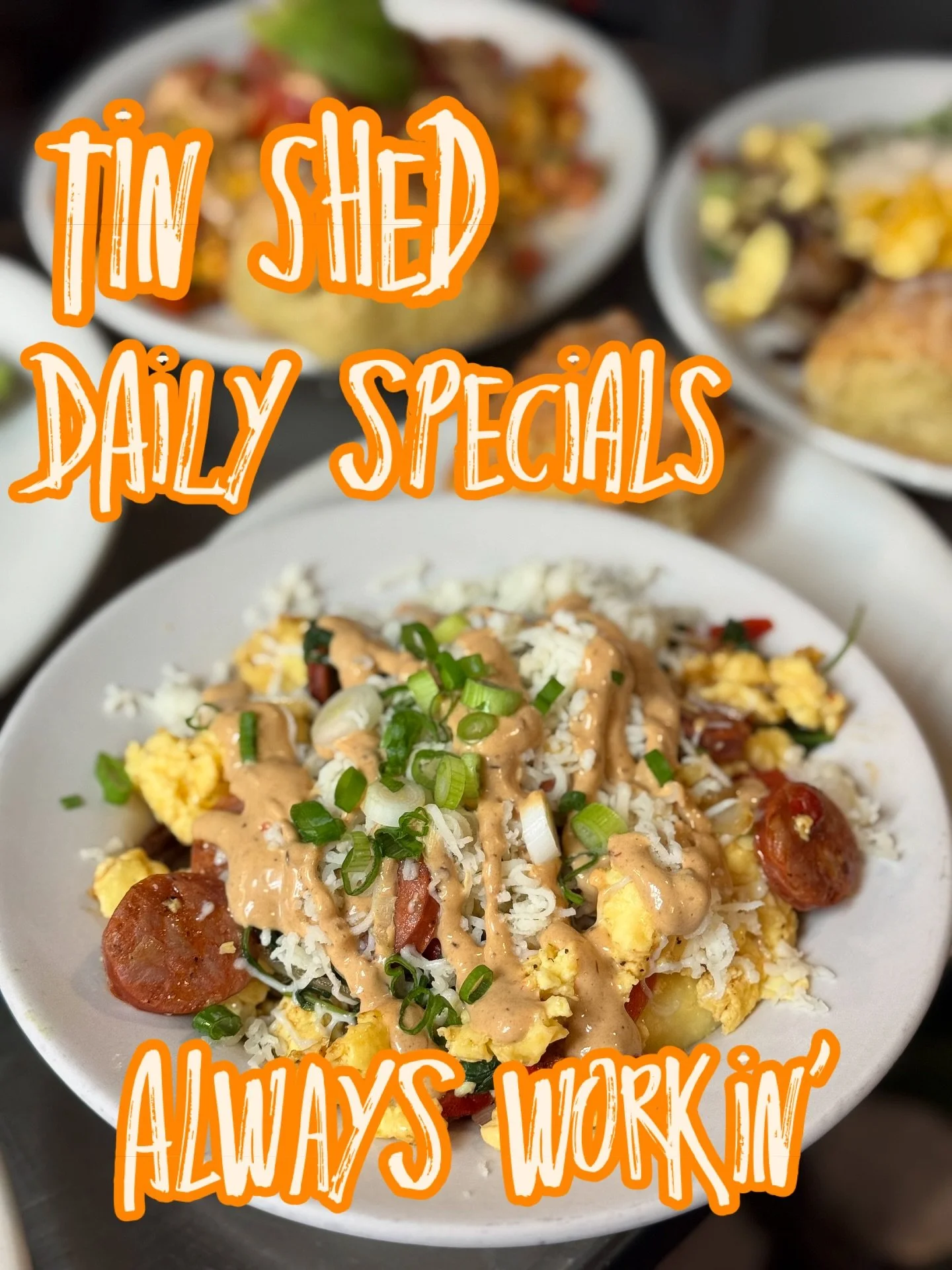 The Tin Shed features unique breakfast specials every day. This tasty number features scrambled eggs served atop either potato cakes or cheese grits, served with lingui&ccedil;a sausage, onions, roasted red peppers, arugula, topped with shredded prov
