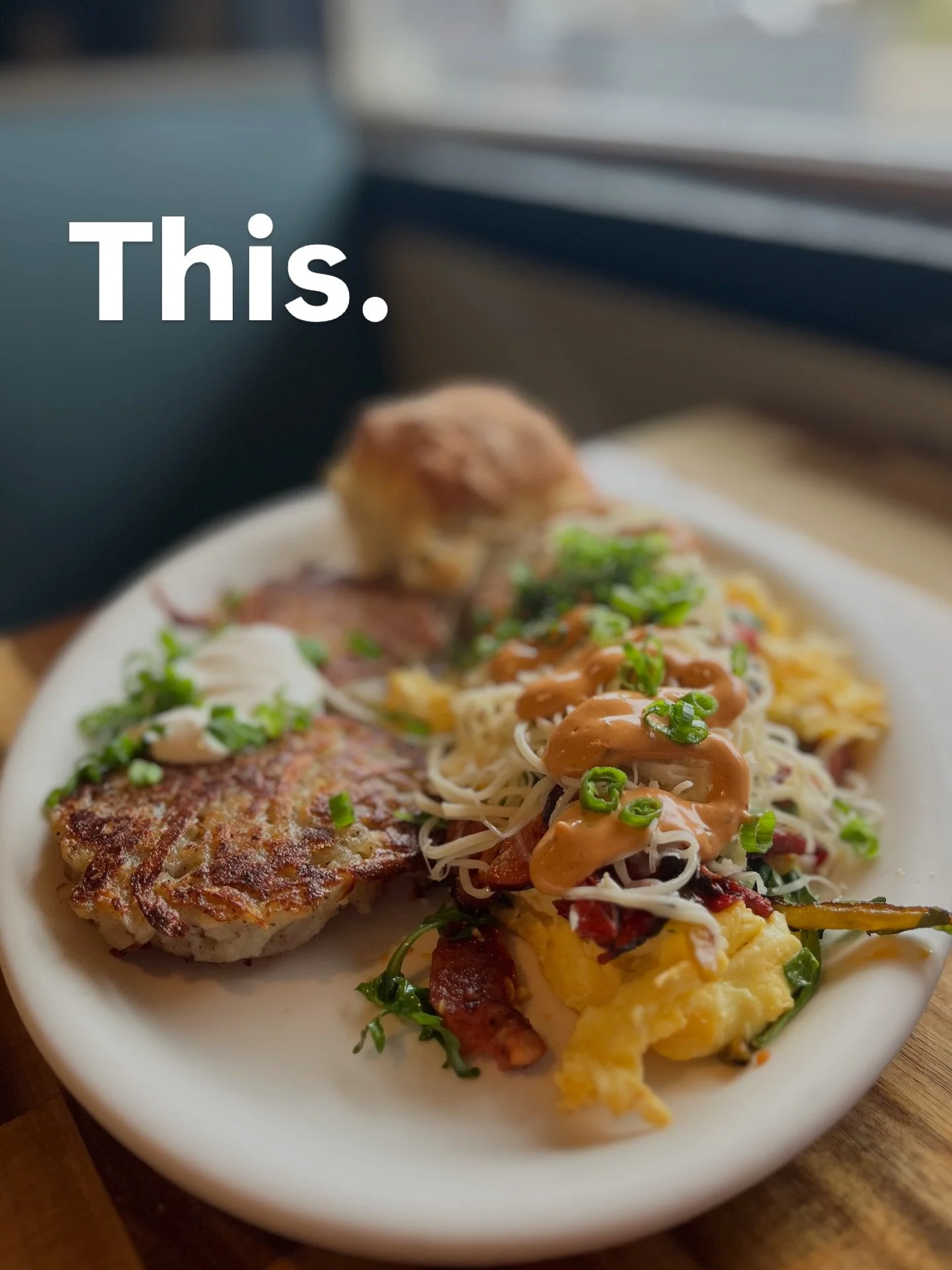 Our special is&hellip; special. It&rsquo;s scrambled eggs with lingui&ccedil;a sausage, roasted poblano peppers, sundried tomatoes, and arugula, topped with smoked Swiss, chipotle aioli and green onion, served with potato cakes or cheesy grits and a 