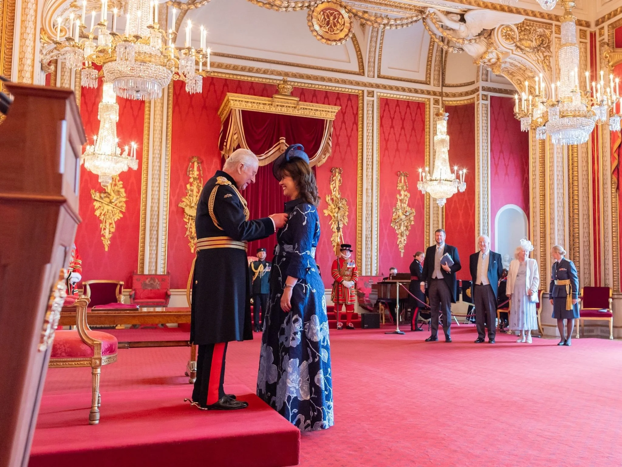  Caroline Redman Lusher accepts her MBE from King Charles at Buckingham Palace and shares her special day with the Rockies!