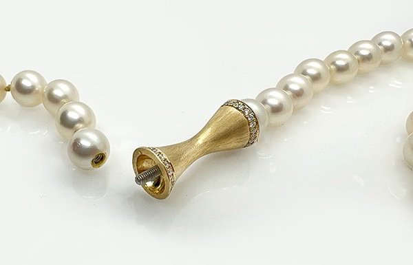 Strand of Pearls with Gold Trumpet Mystery Clasp