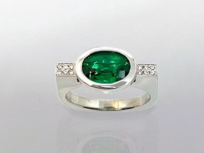 Oval-emerald-linear-bezel-ring-pave-shank-top.jpg