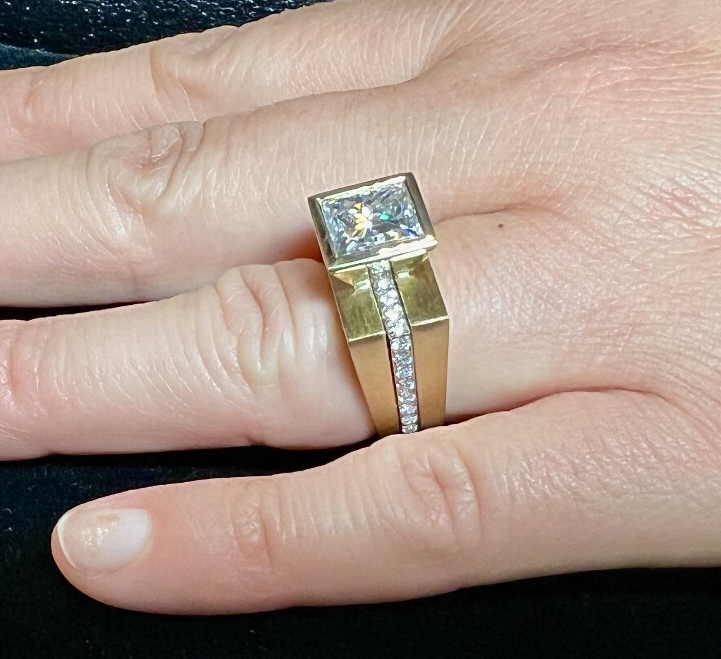 Wedded bliss!  2.0 cts princess cut diamond in yellow gold tapered bezel and squared shank ring with pace&rsquo;d diamond band to fit in between .