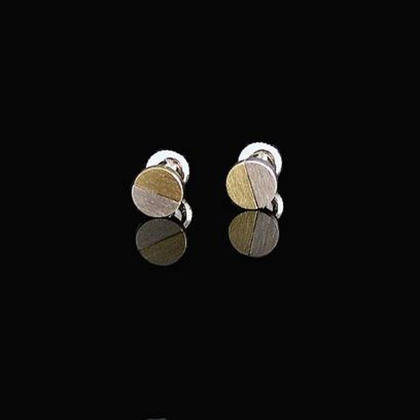Two-toned yellow/white gold earrings. Simply Modern!