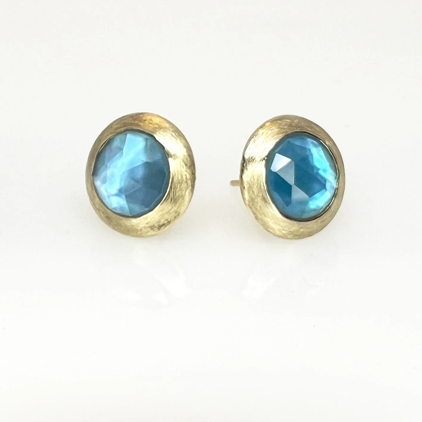Summer splendor yellow gold stud earrings set with rose cut swiss blue topaz earrings.  Reminds me of the summer sun dancing on the seas.  These earrings are also make to order in silver and gemstones.  Happy Summer! 

#gemstoneearrings #summersplend