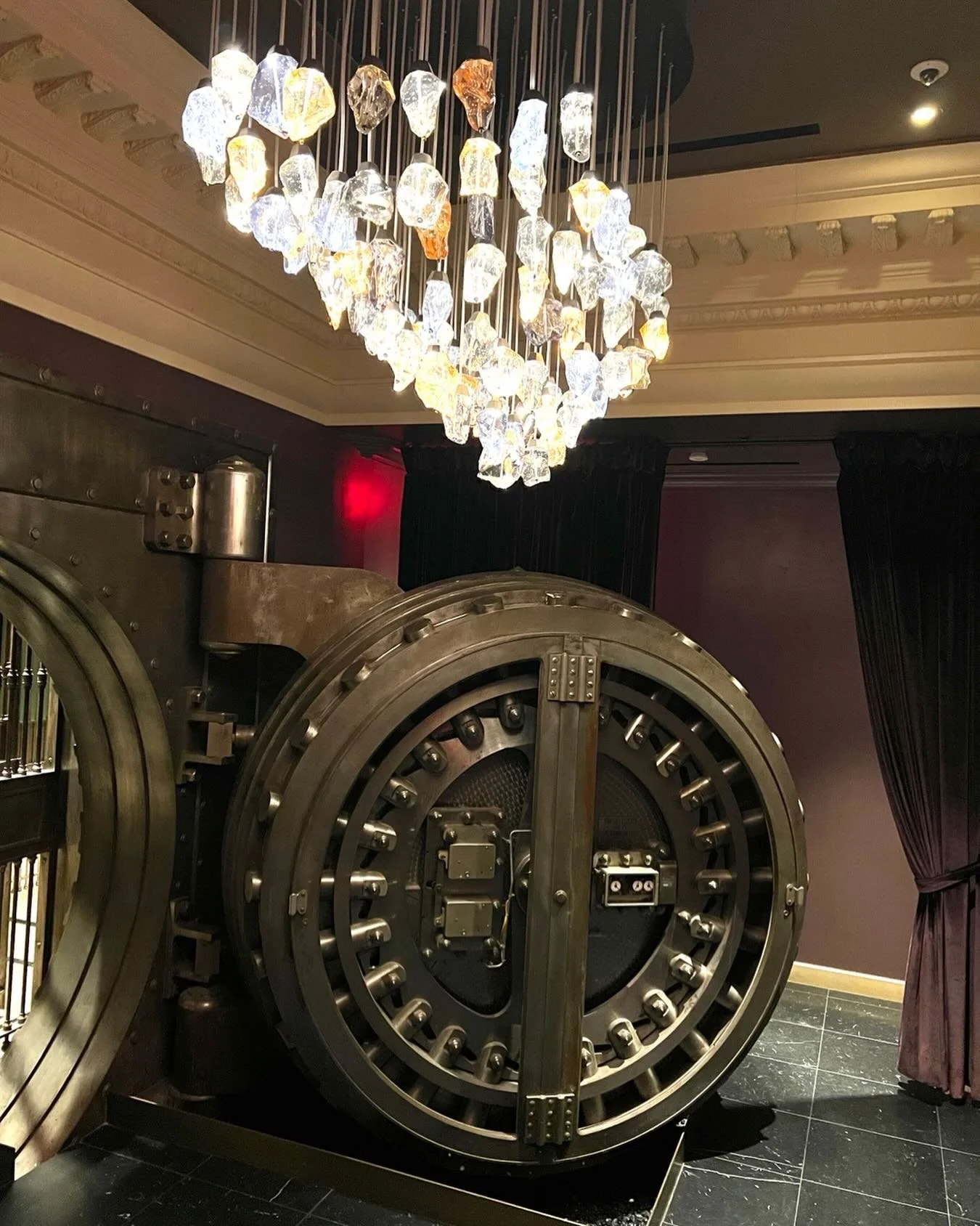 In the basement of the now Per LA hotel downtown LA, this vault is still there from the bank that once occupied the building.  I also love the contrast of the contemporary chandelier with its lit up hanging crystal rocks.  Reminds me of jewelry.  Hav
