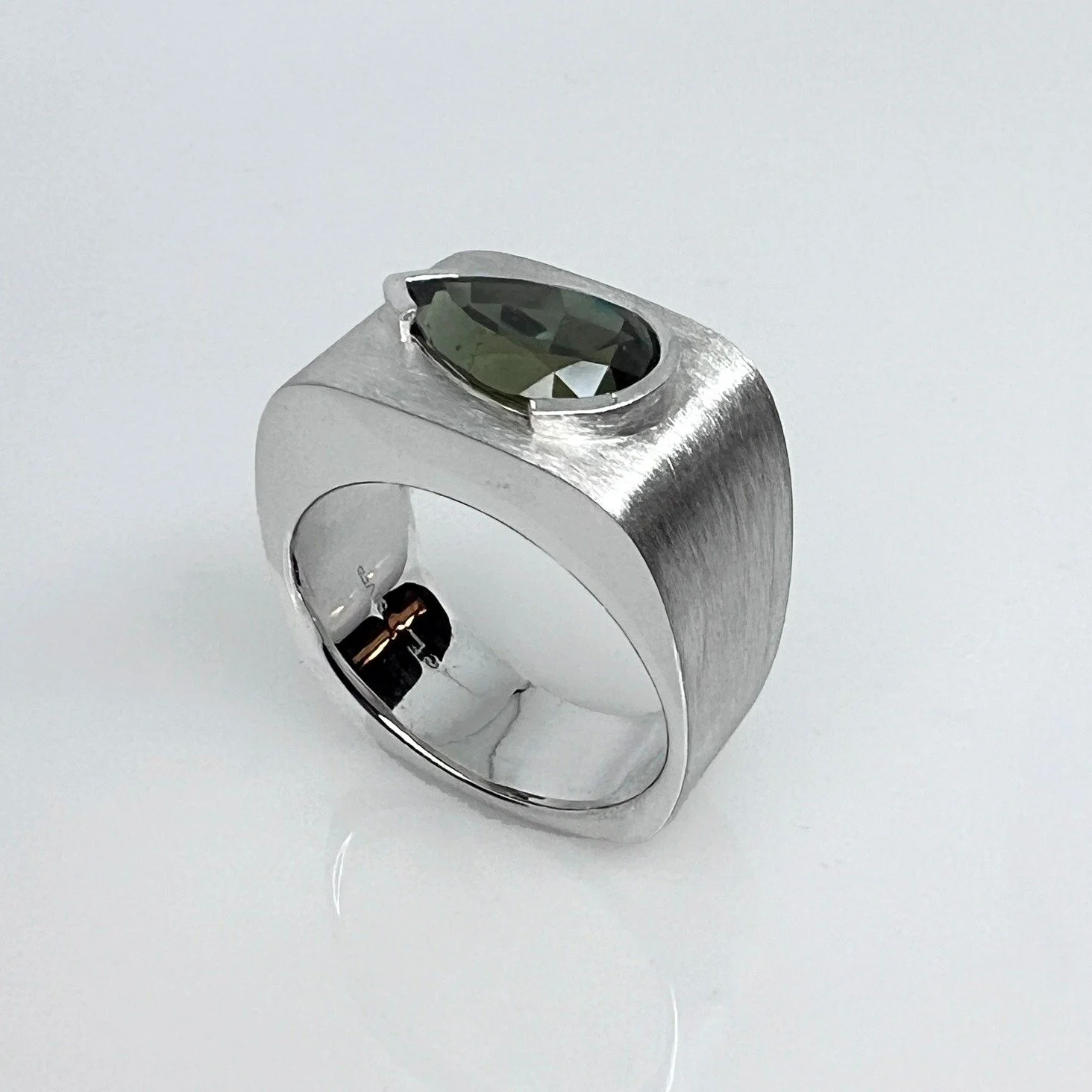 Custom Graduation Gifts designed with the future in mind.
Teardrop Sapphire Ring for a young man graduating from high school. Inspired by the tradition of a class ring, it was designed to be timeless rather than tied to a particular year or instituti