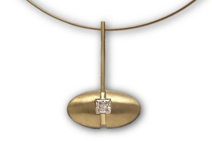 Elipse pendant in yellow gold with princess cut diamond.  Personalizable with different metals and center stone. 

#yellowgoldpendant #diamondpendant #contemporaryjewelry #breweryartwalk #personalizedjewelry #customjewelrydesigner