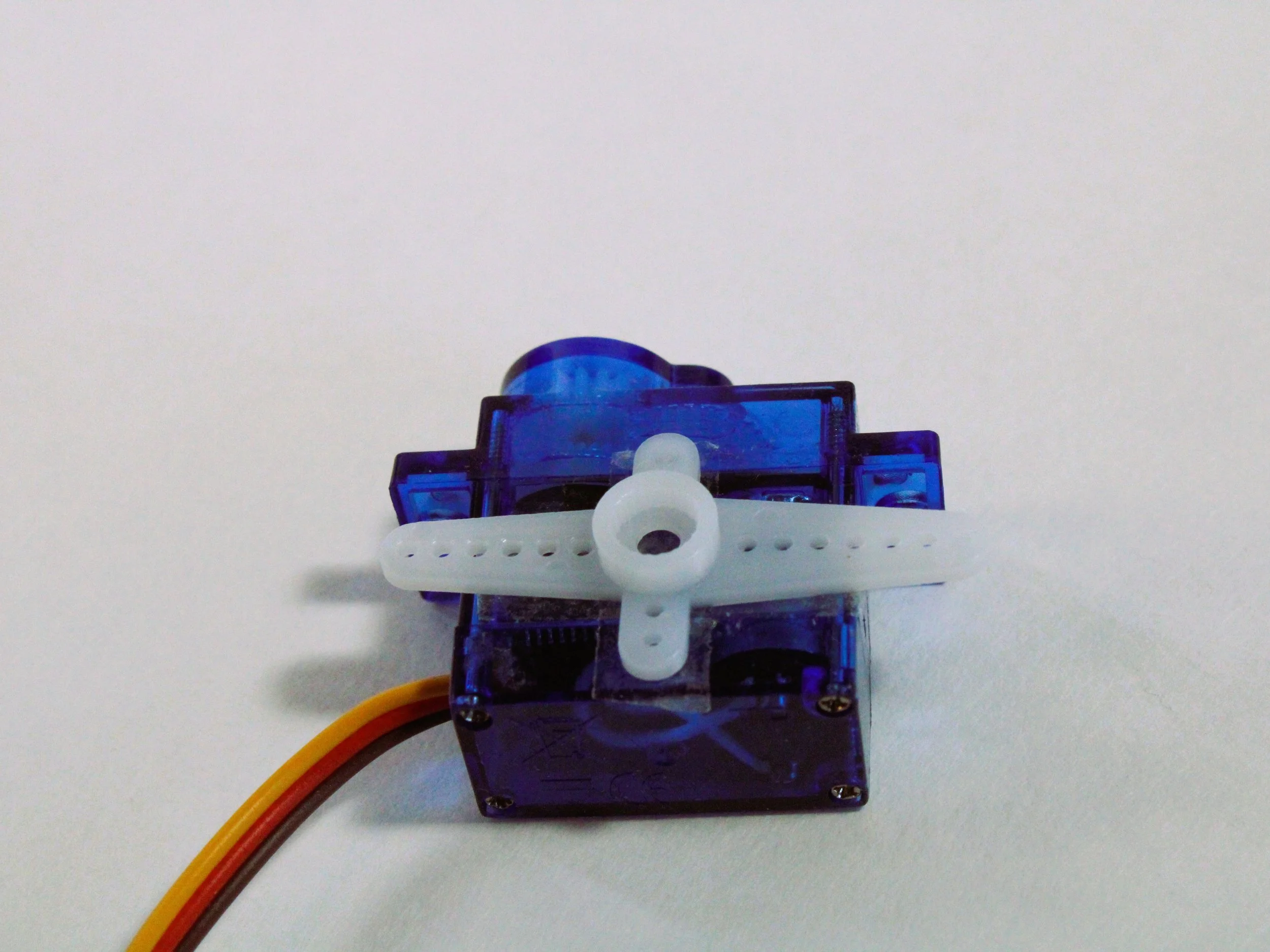 2. Tape long servo horn to 2nd motor