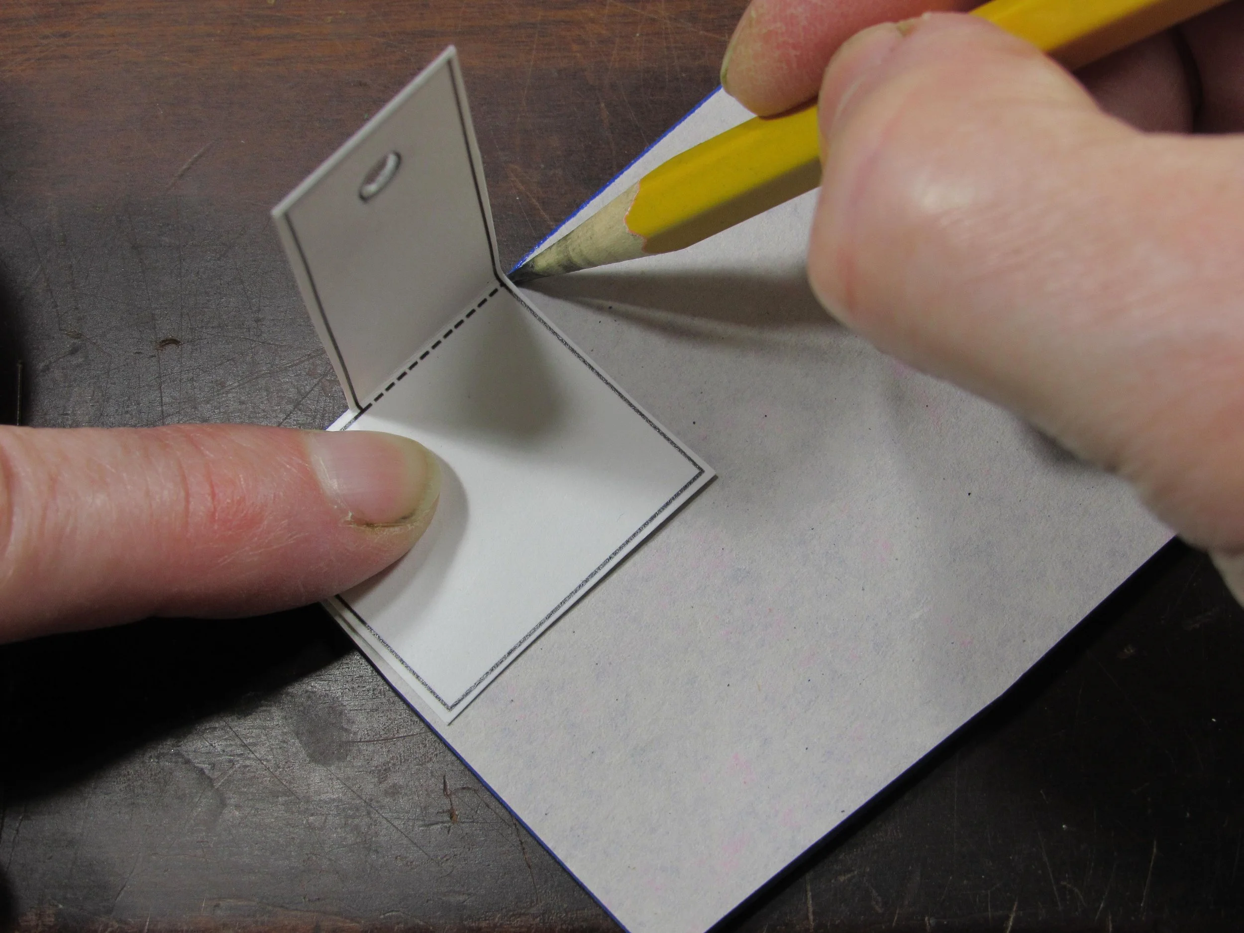 Trace around the foot on the back of the foam