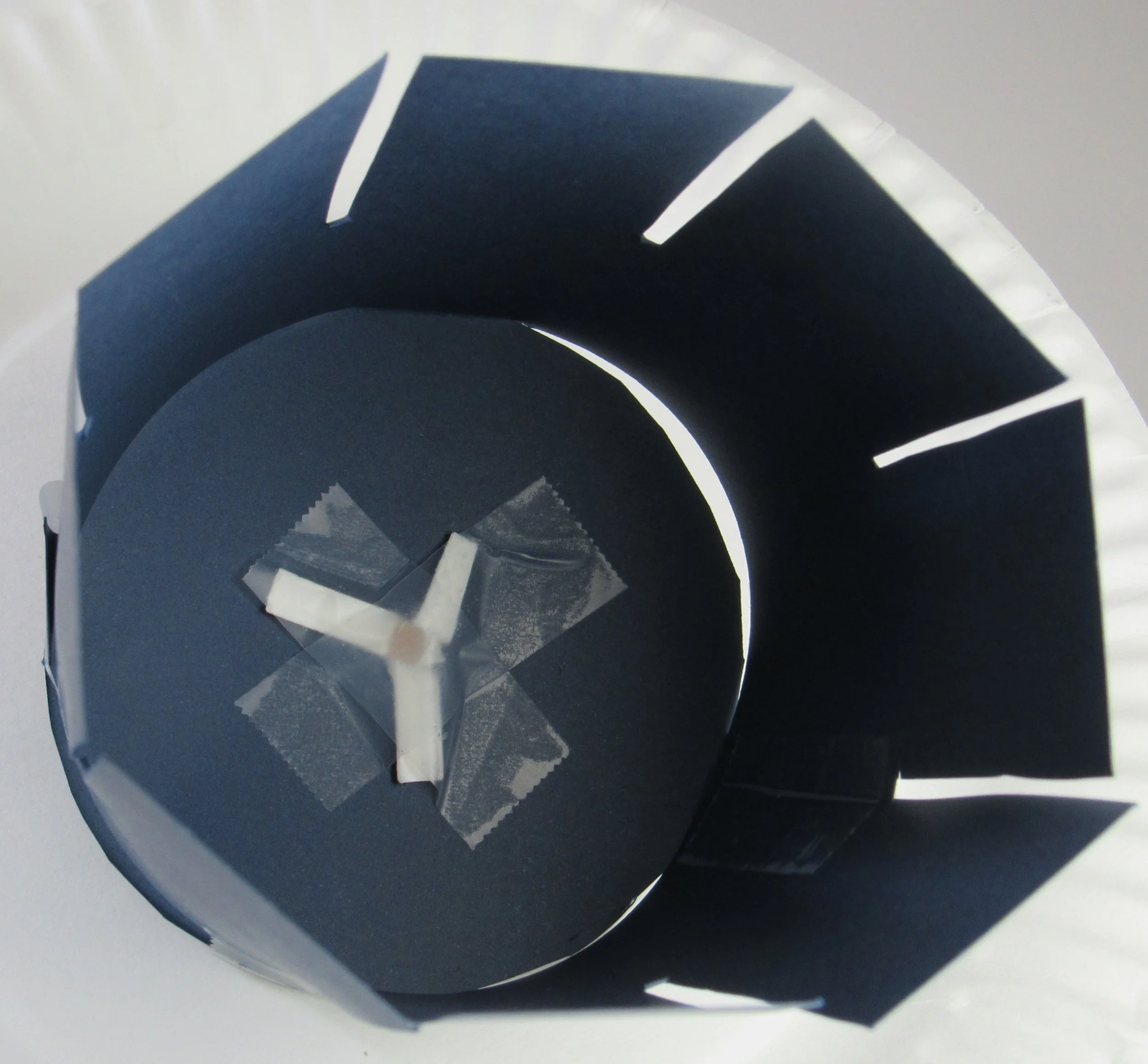 Punch hole and tape bottom closed. 