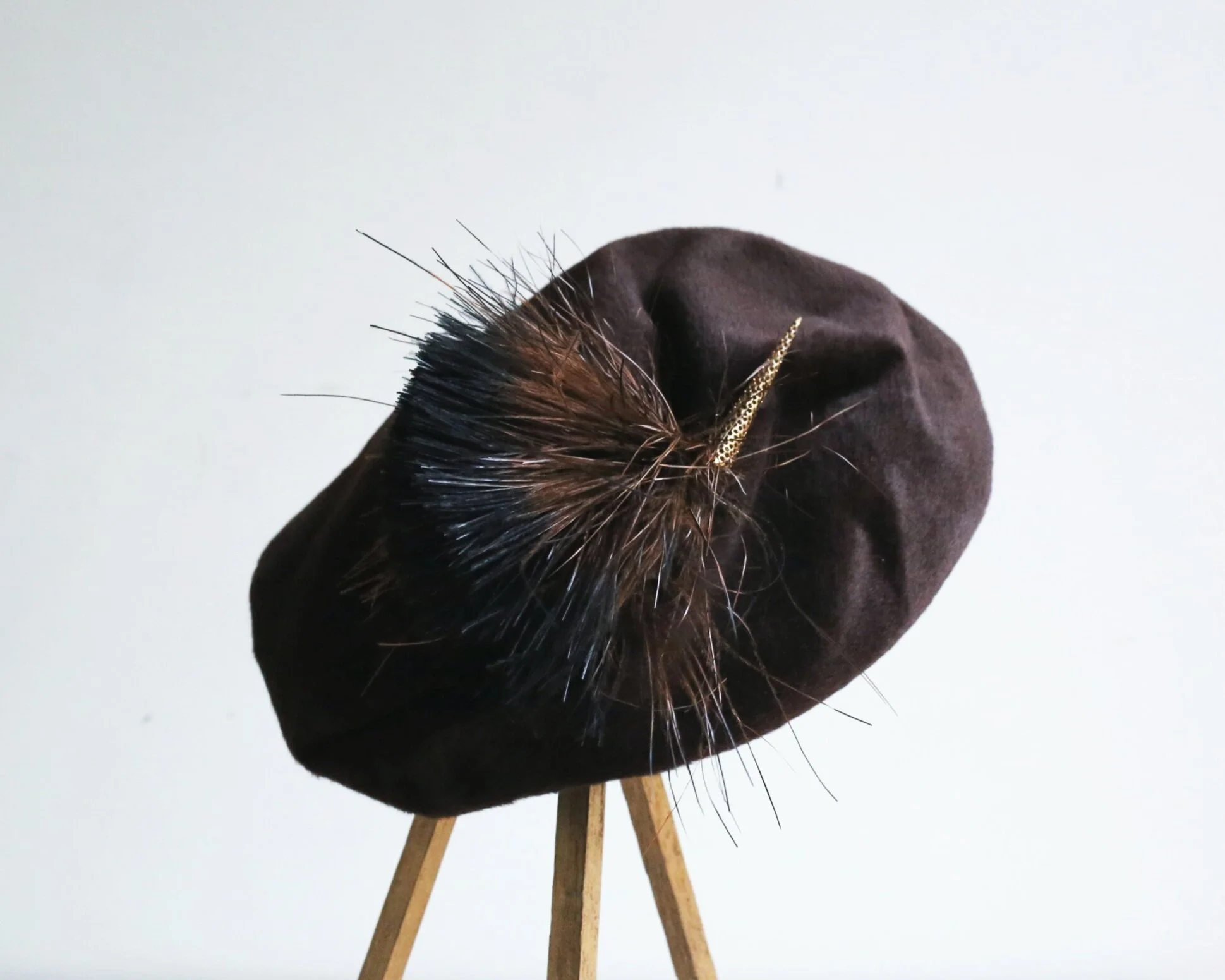 1950s  chocolate brown felt beret with feather detail