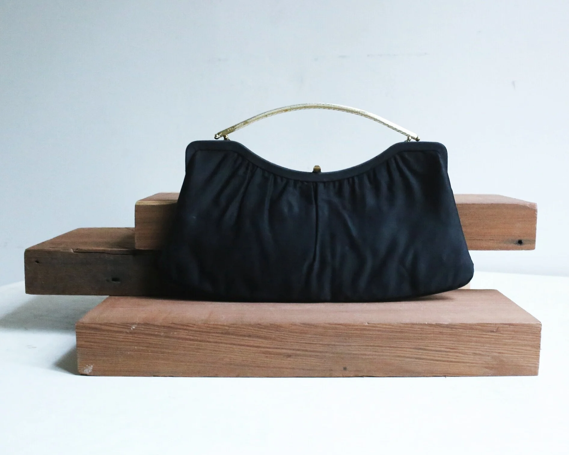 1950s / 1960s gold and black satin clutch bag with coin purse