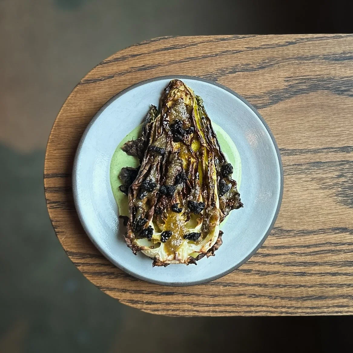 HISPI CABBAGE 

Cilantro crema, fermented pepper vinaigrette, Moroccan olive 

#dinneratbarbs #bybarbara #barbararestaurant #chinatown #chinatownvancouver #chinatownyvr #supportlocalbusiness #supportlocal #supportlocalrestaurants #vancouverrestaurant
