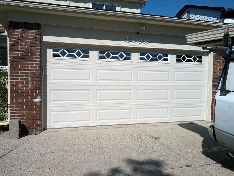 New Garage Doors and Broken Springs Replaced in Royal Oak Clawson MI