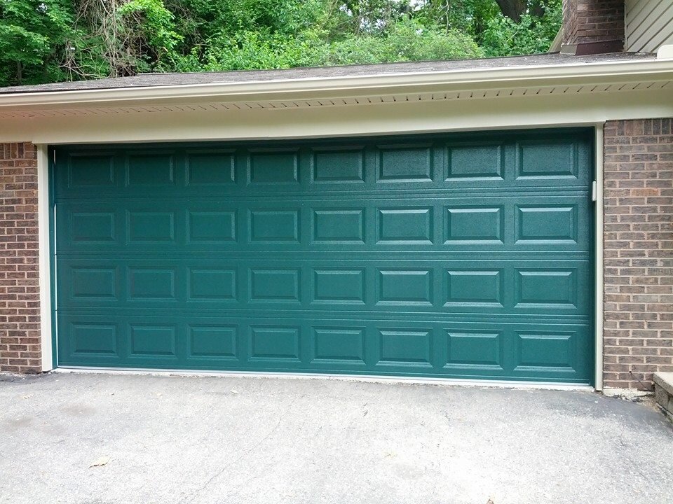 Heavy Duty Insulated Garage Doors installed or Repaired in Troy Michigan