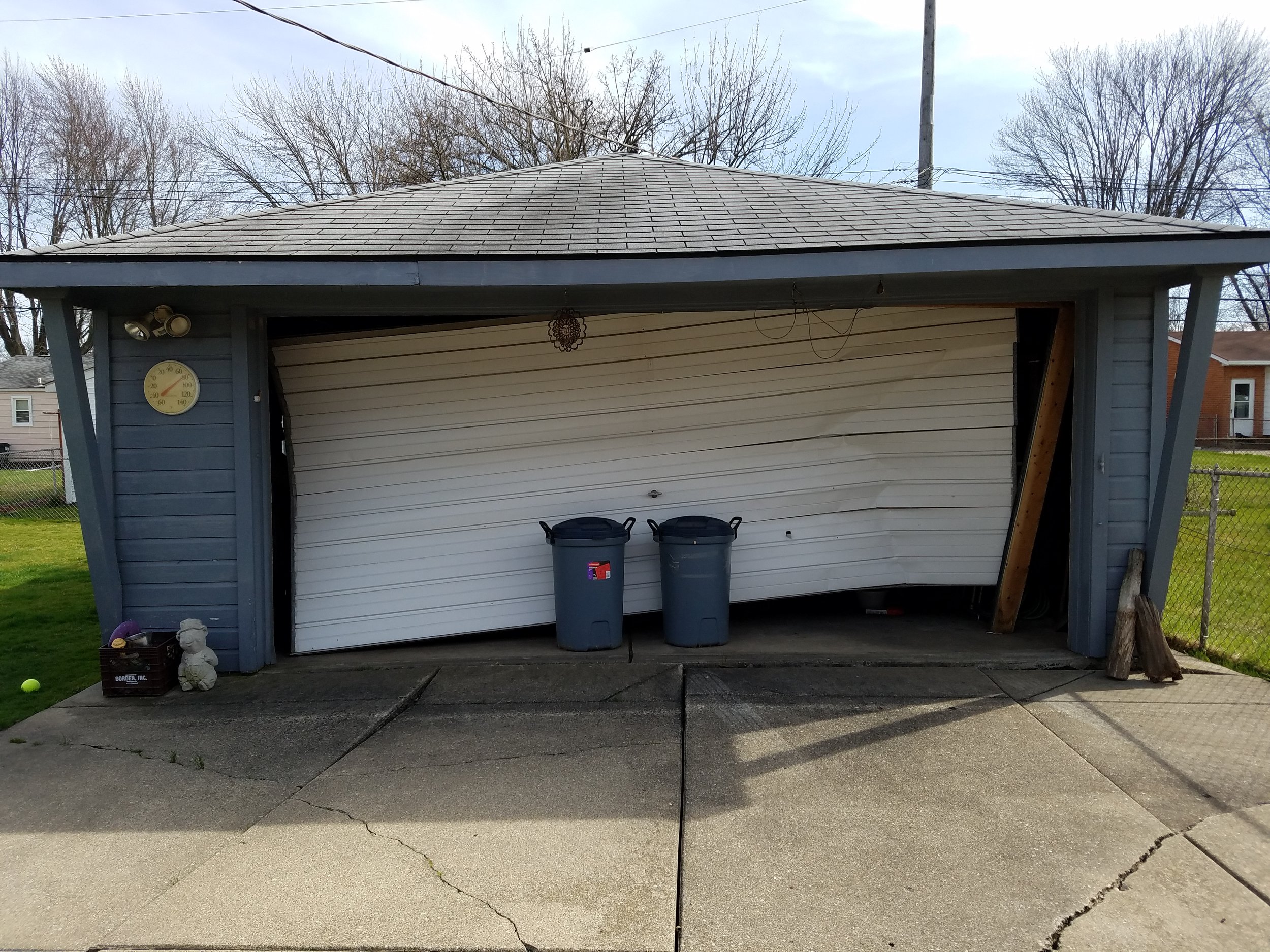 Service Fix Garage Door Spring Michigan