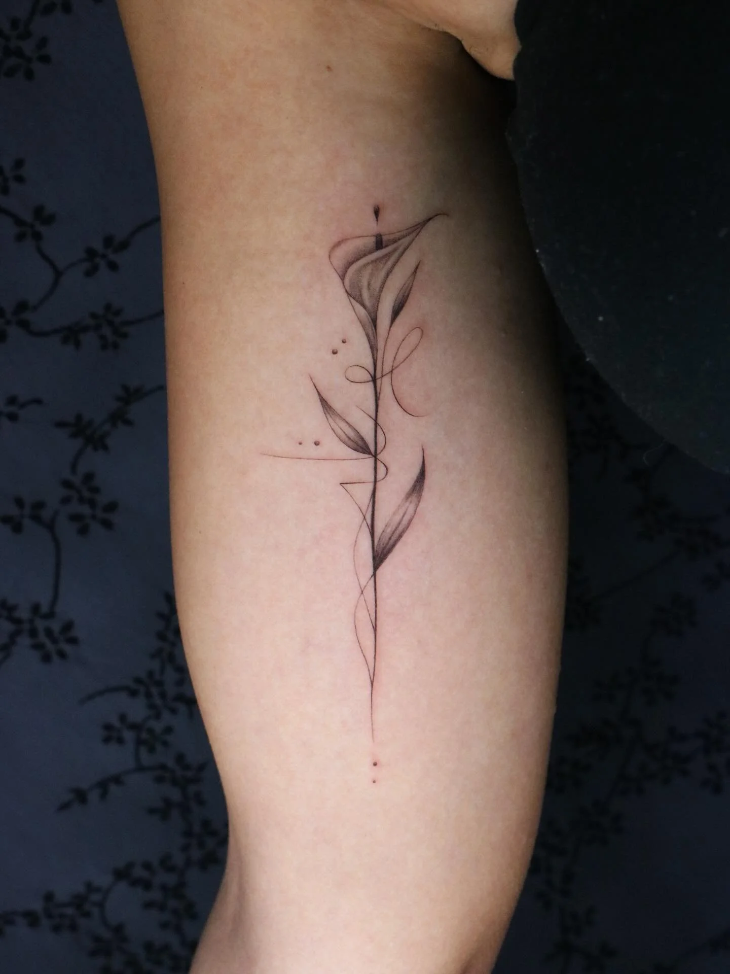 Not my original design.

Had a good time doing this tattoo, design done from an artist in Egypt contracted by my client.

Very elegant, I love the use of lines in this.