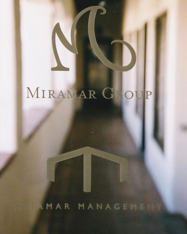 Our office door at @los_arcos_sb, @miramar_group_sb had its logos designed by @peterhorjusart who has the greatest eye for design. #santabarbara #spanishstyle #logo #downtown #art #design #miramar #property #management #development