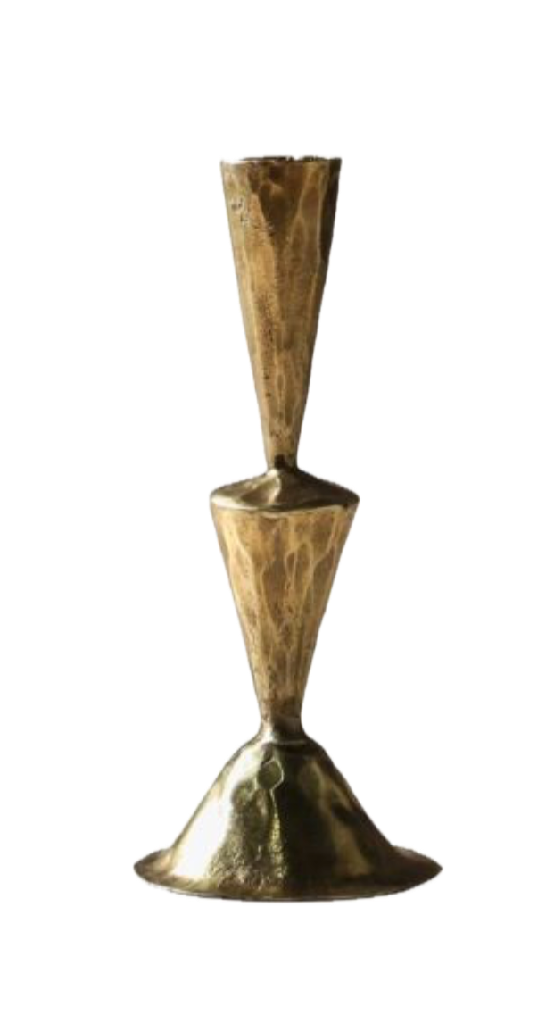 A brass sculptural candle stick holder with three connected conical shapes stacked vertically and a flared base.