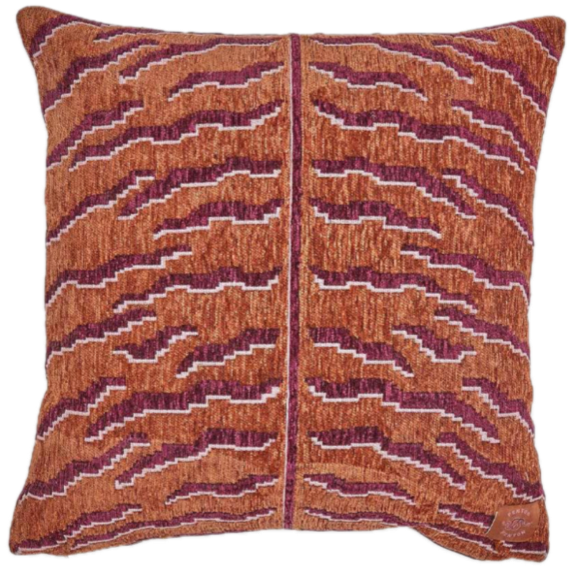 Decorative pillow with orange and purple zigzag pattern.