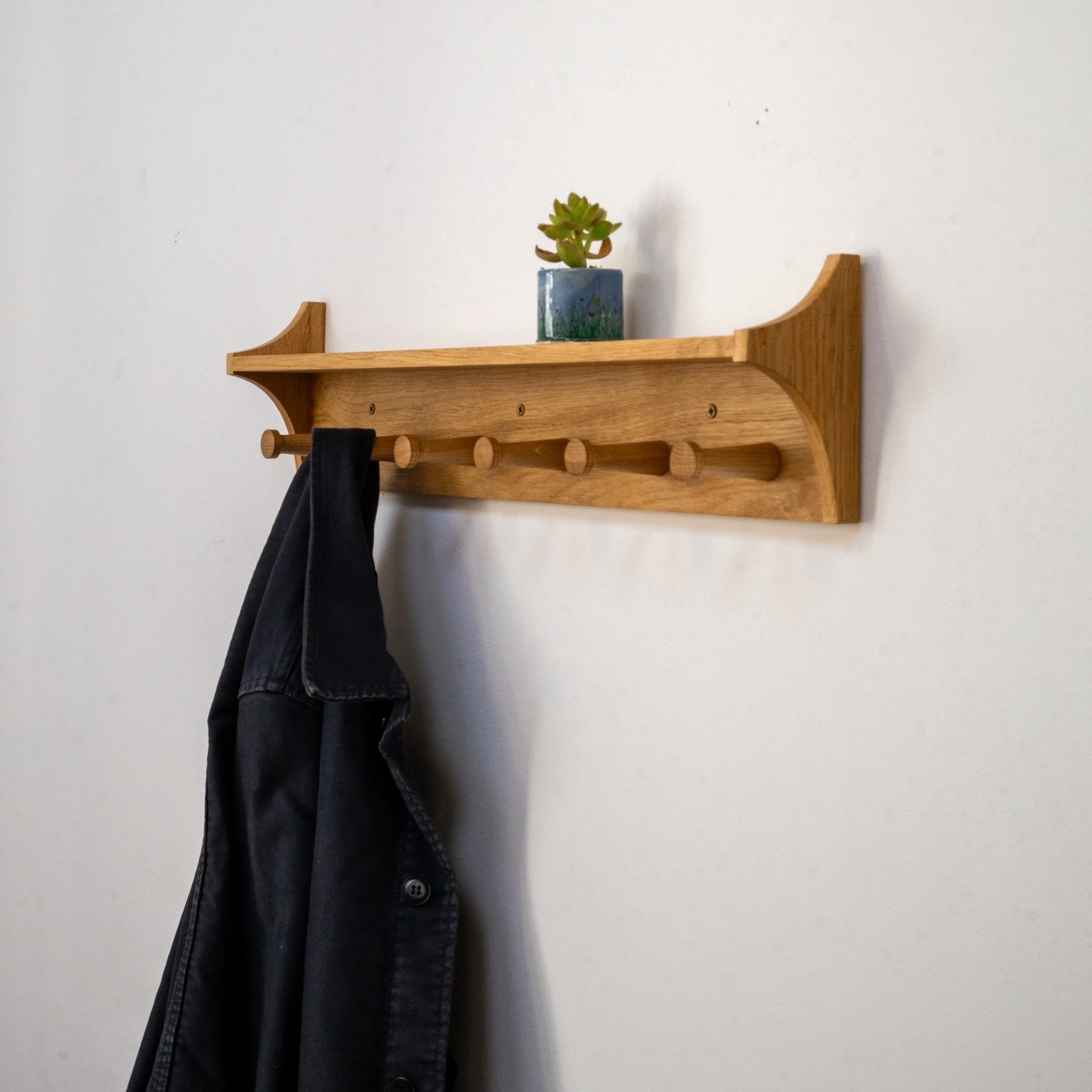 Oak coat rack natural 6 hookswith jaclket.jpg