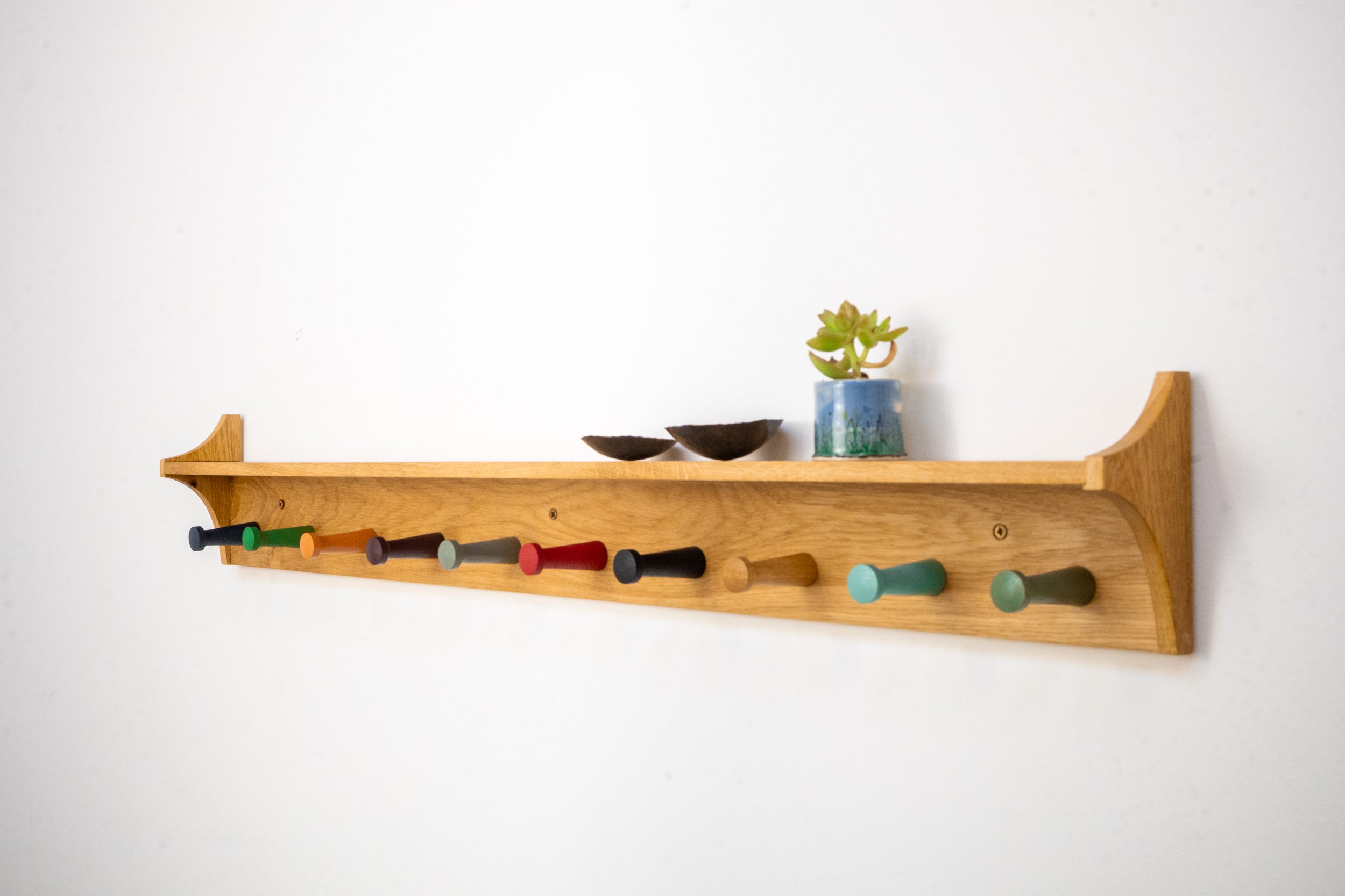 10 Long Coat Rack with rainbow hooks, side view.jpg