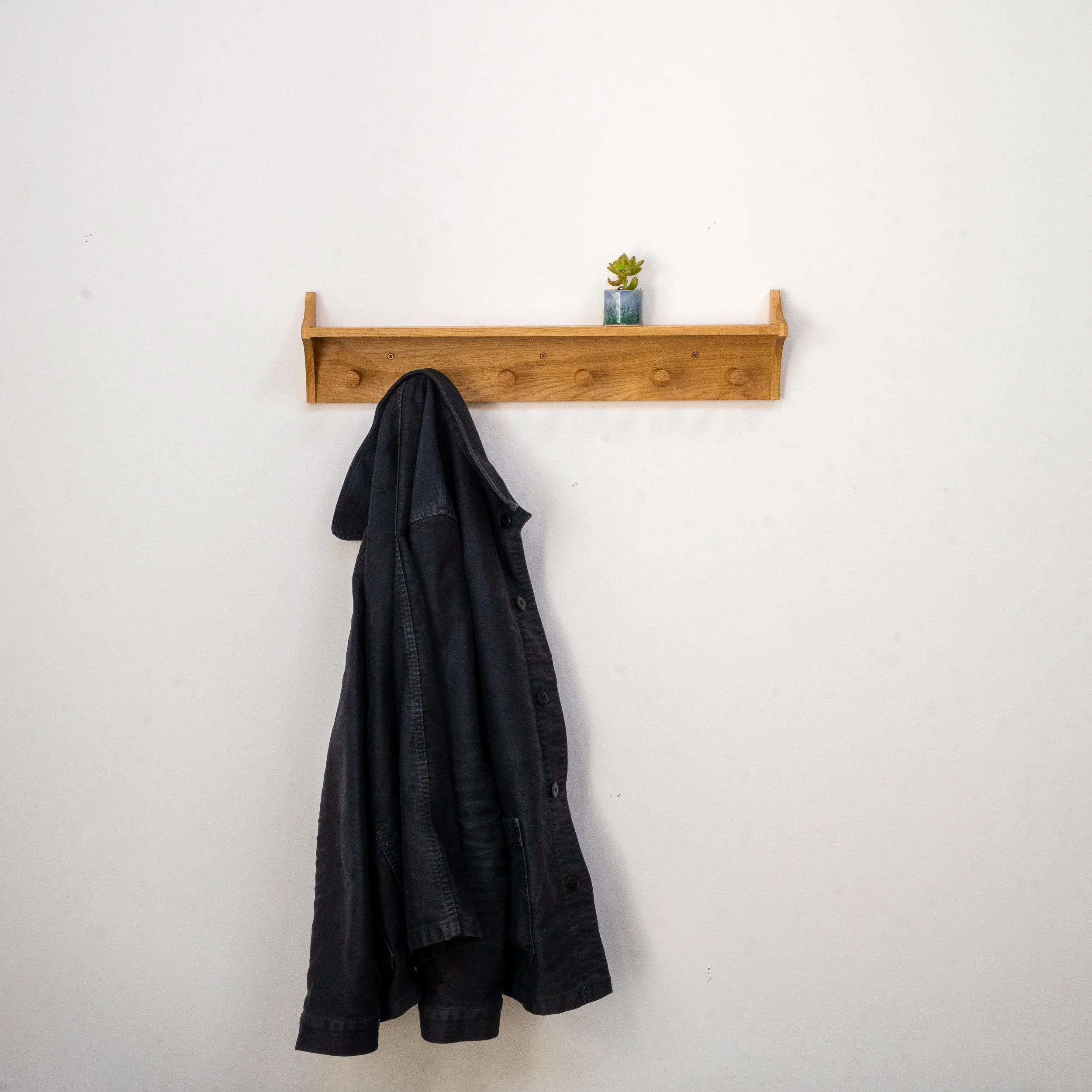 Oak coat rack 6 Hooks with Jacket.jpg