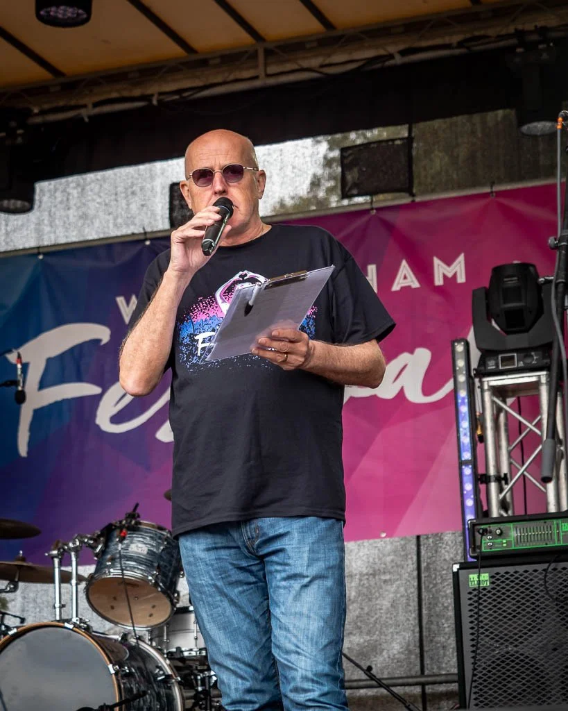 Andy Rowe on stage at Wokingham Festival