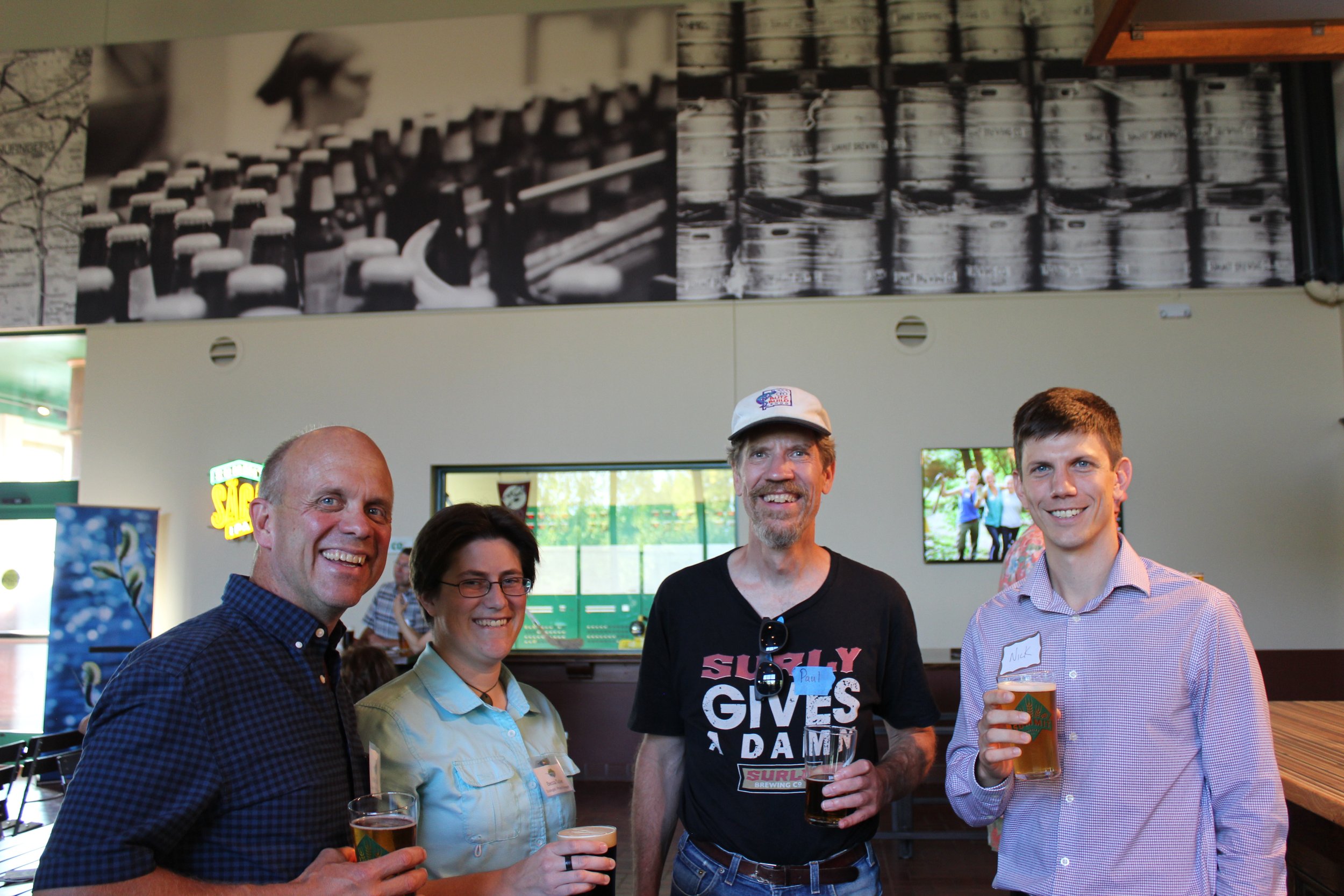 Staff and volunteers enjoy refreshments at the 2018 Buckthorn Beer Bash