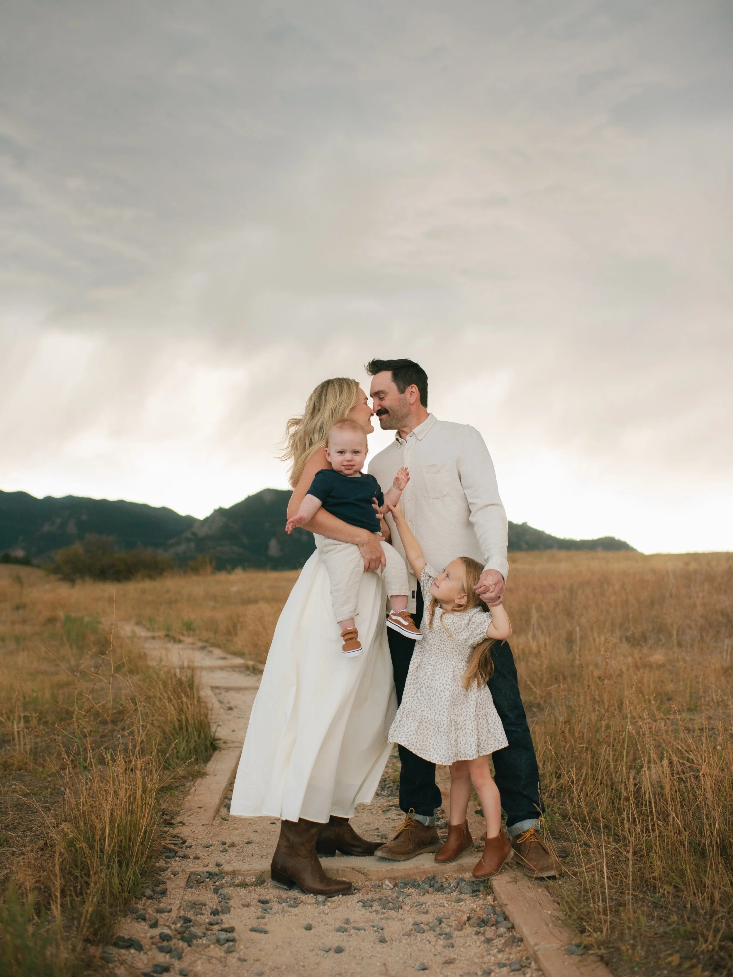 Sun, down pouring rain &amp; wind &mdash; was not stopping us from this shoot✨ always love seeing this sweet fam!