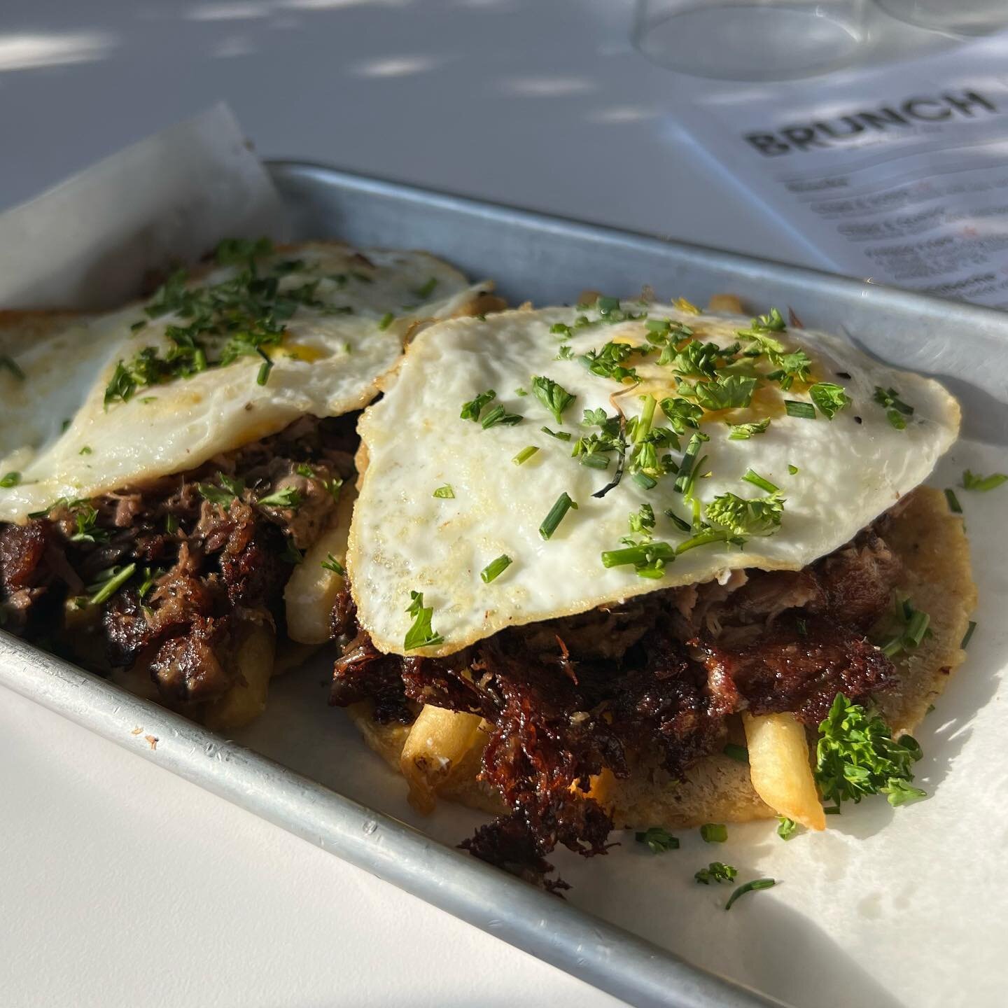 PRAISE BE, the Lamb is with us. And he&rsquo;s brought friends 🐑 
Behold &ldquo;The Fryin&rsquo; &amp; The Lamb&rdquo;: braised lamb carnitas, root veggie pur&eacute;e, fresco fries, over-medium egg, and parsley &amp; chive. Here for a limited time,