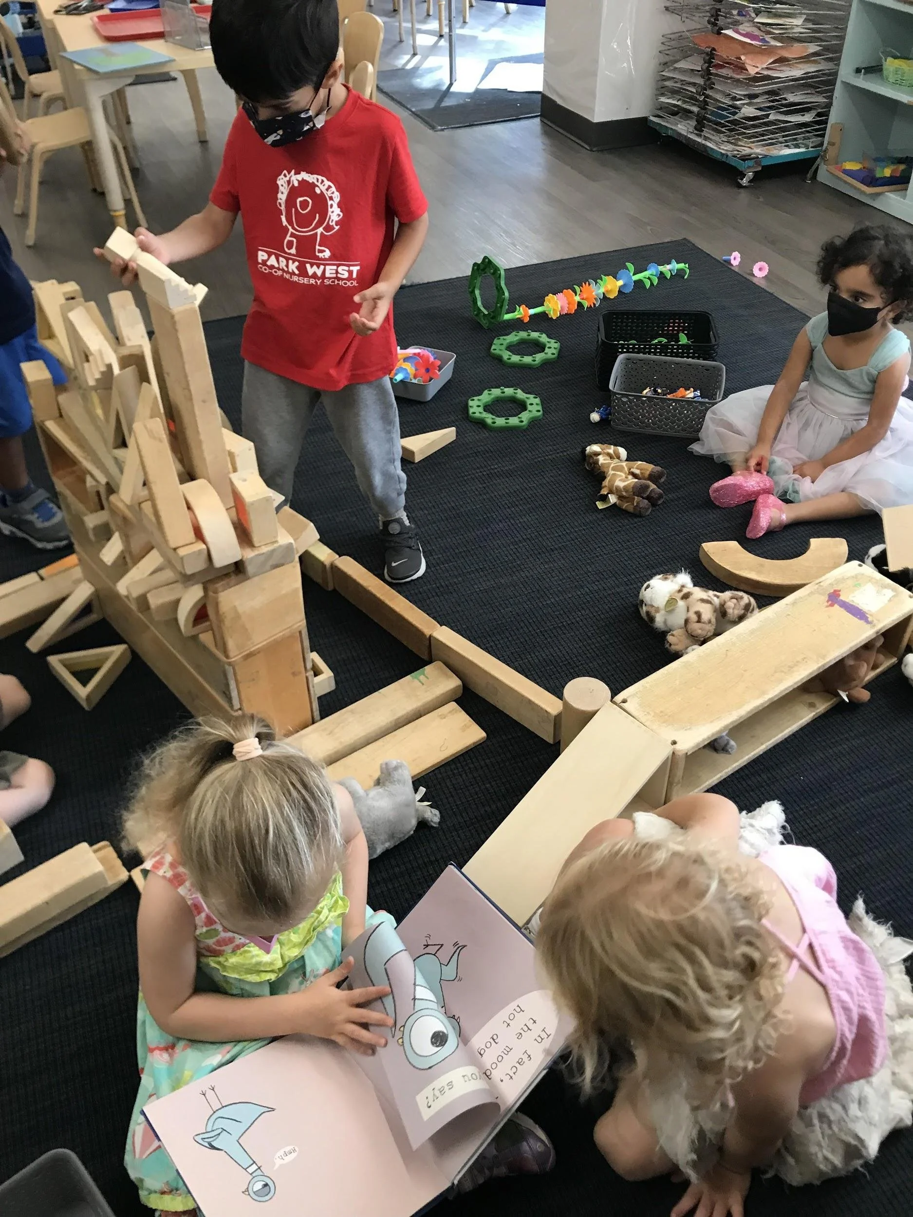   Building, reading, watching the construction of the “flip cars” hiding spot.  