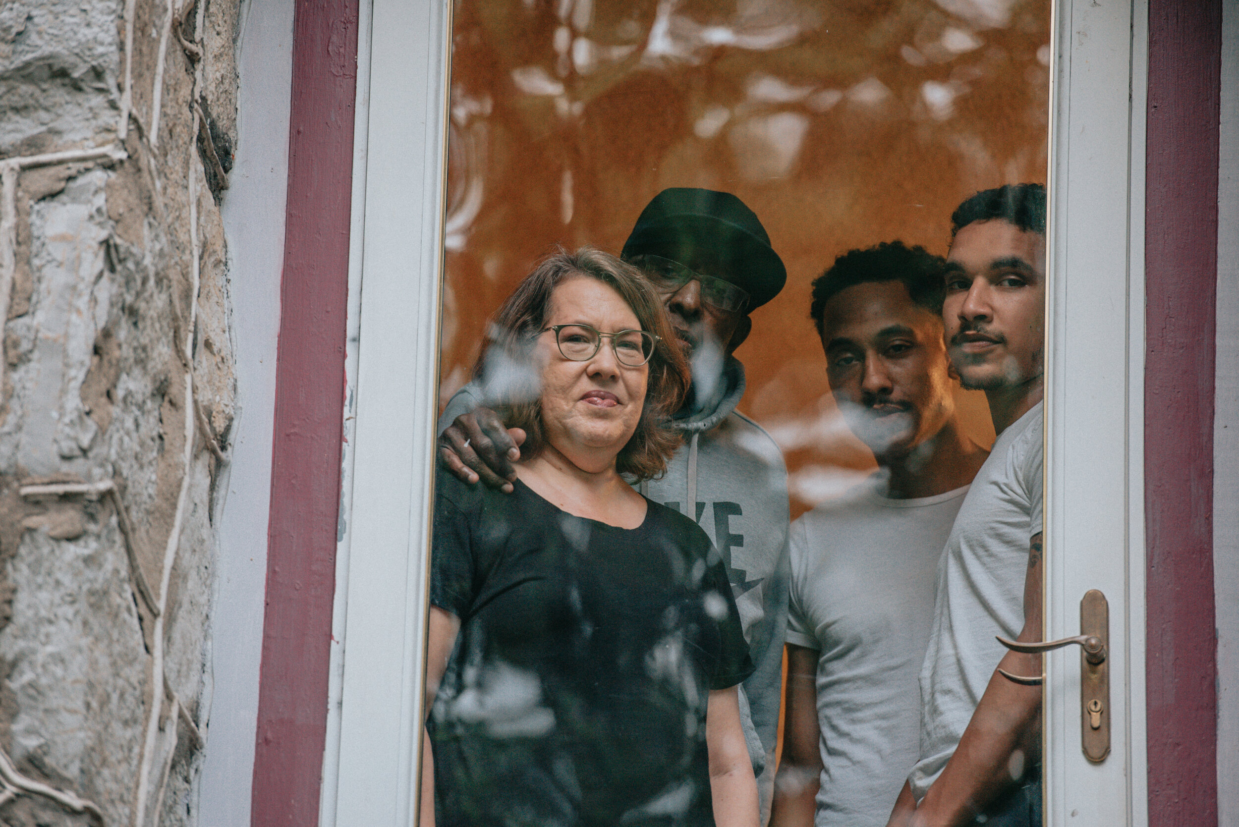  Reed Schick (American, b. 1997)  The Crumble Family at their window in St. Elmo,  Chattanooga, April 2020 , from the series   Seeing St. Elmo , 2020 Digital chromogenic print 8 x 12 inches Courtesy and copyright the artist 