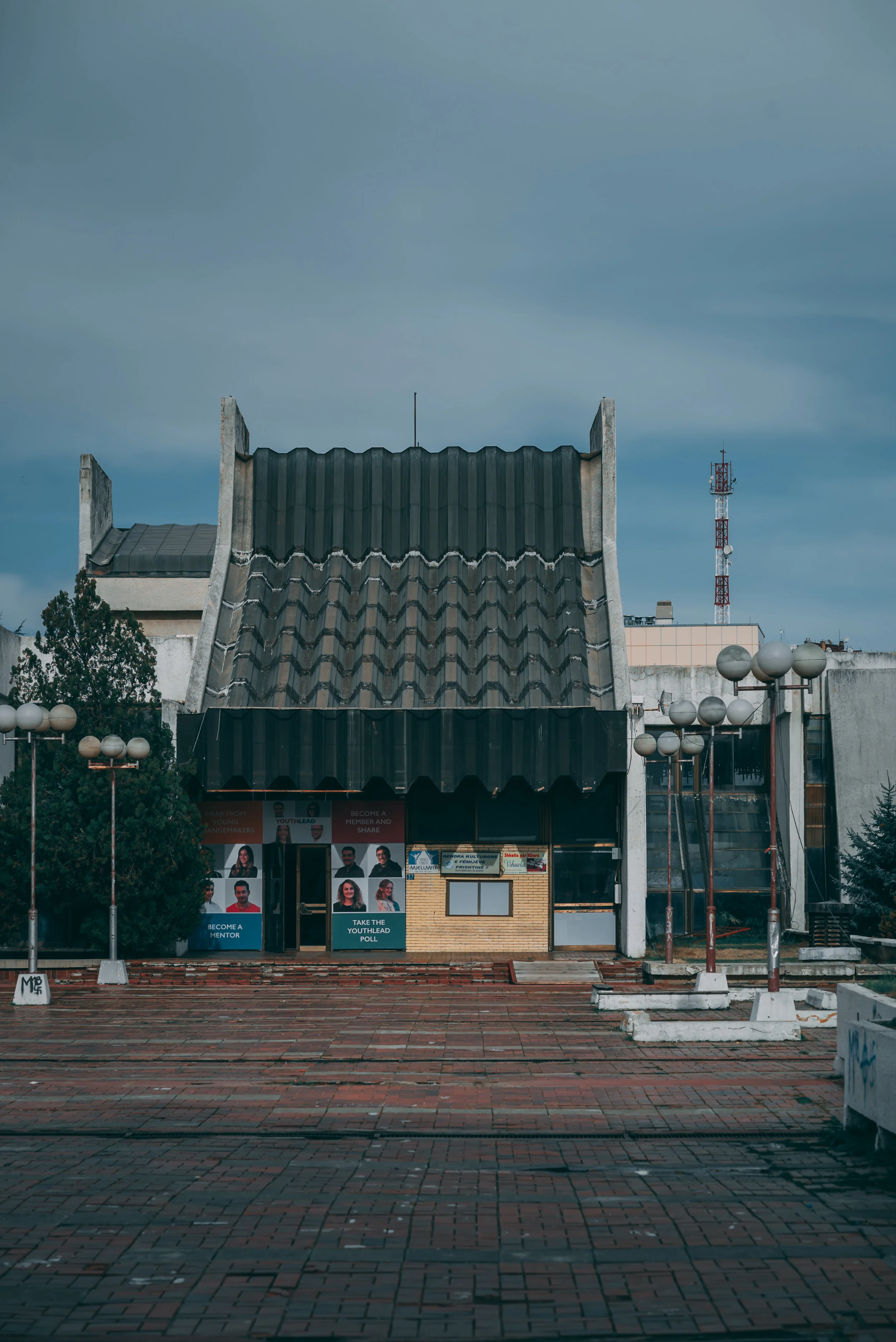  In 1975, a referendum was held, and citizens of Pristina, then capital of the Socialist Autonomous Province of Kosovo, voted in favor of building a large hall. The complex was finished in 1977. It was originally named "Boro and Ramiz" (Albanian: Bor