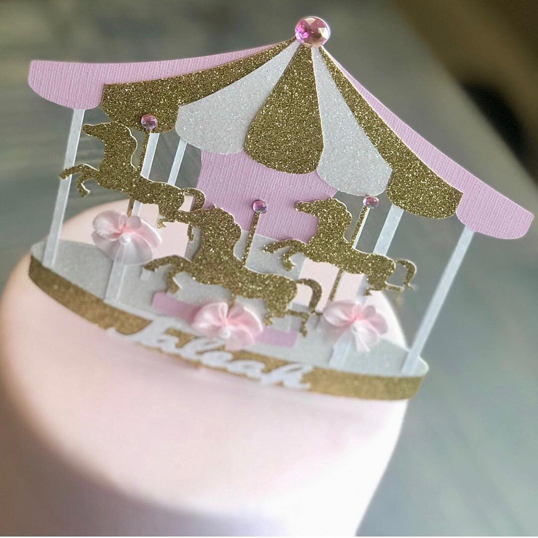 Cute Cakes by Kim  Carousel cake for Alissias birthday  this 2 tier cake  is covered in buttercream icing with fondant accents I created the carousel  cake topper by hand which