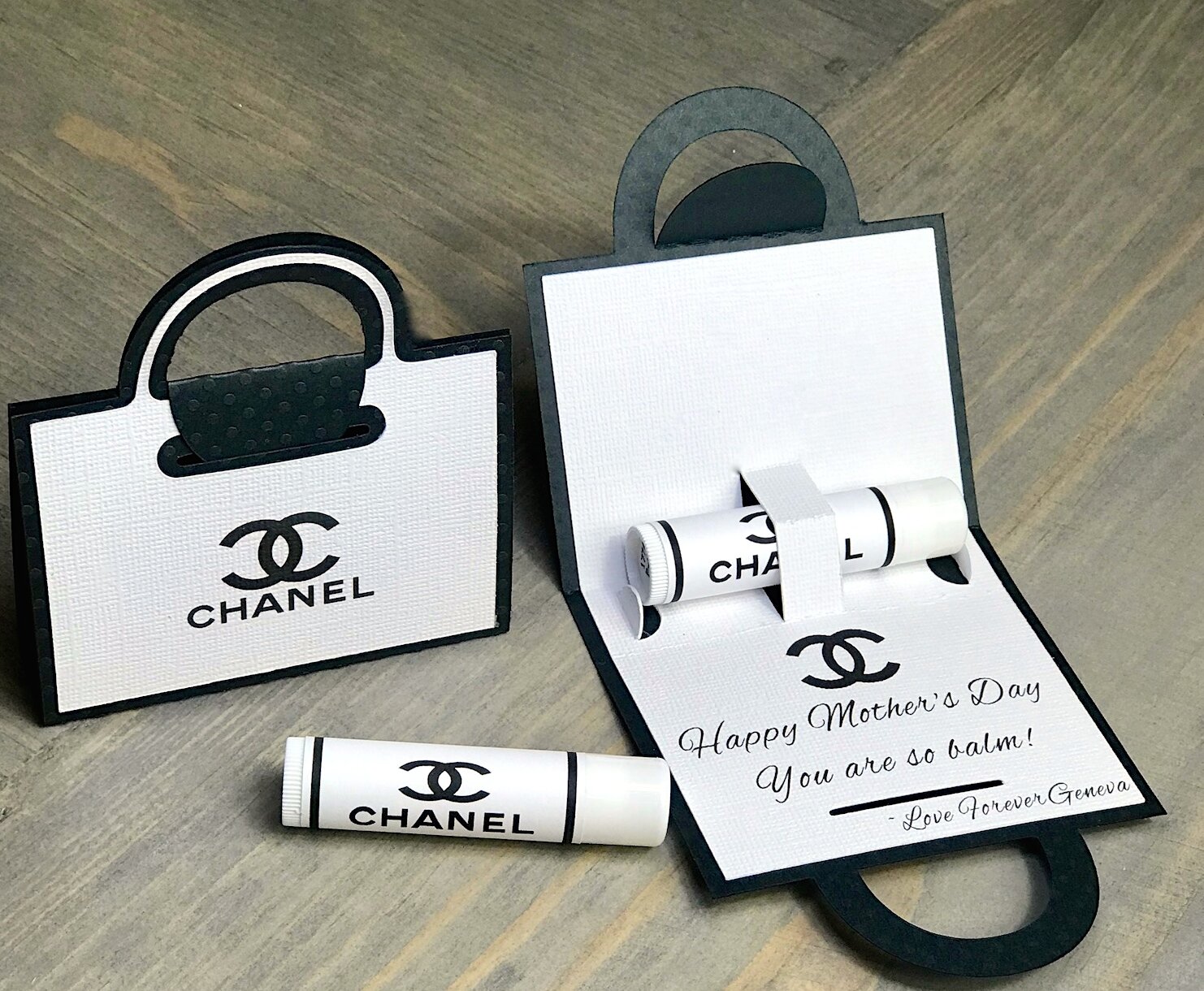 Love the Coco Chanel party favors. HERSHEY'S Nuggets Wraps. Lovely inside  the Chanel perfume label vase.