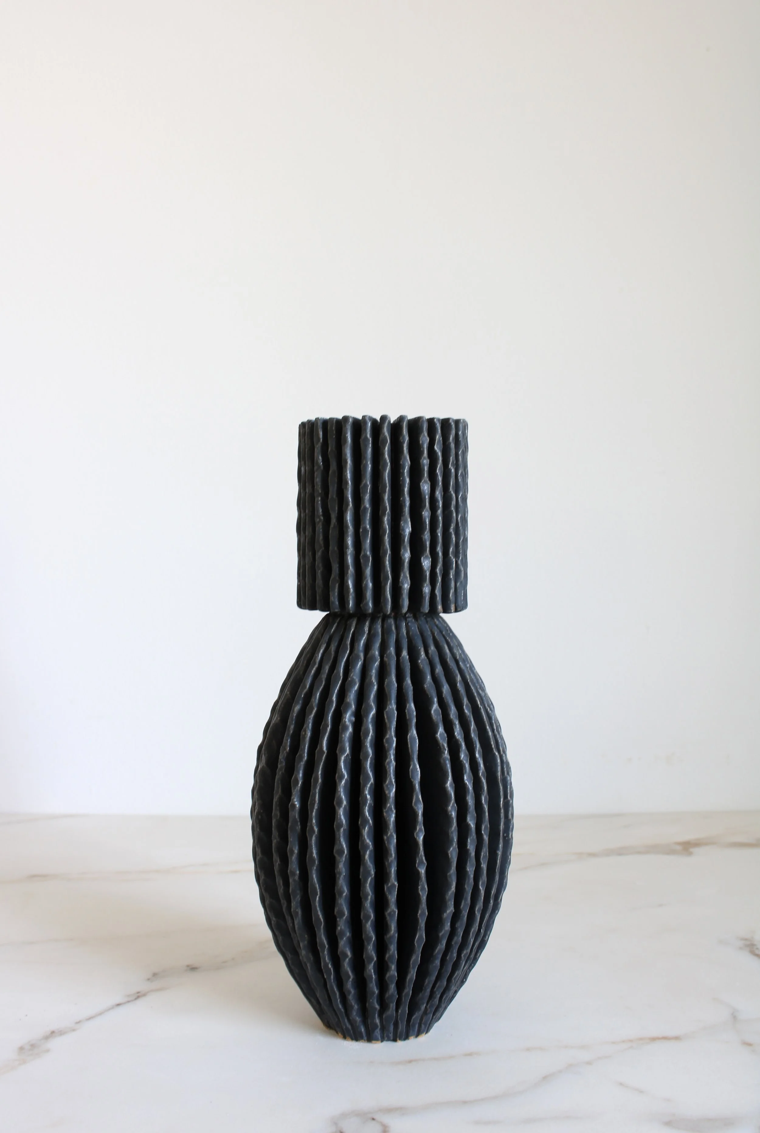 Radial Oval Bottle in Coal Black