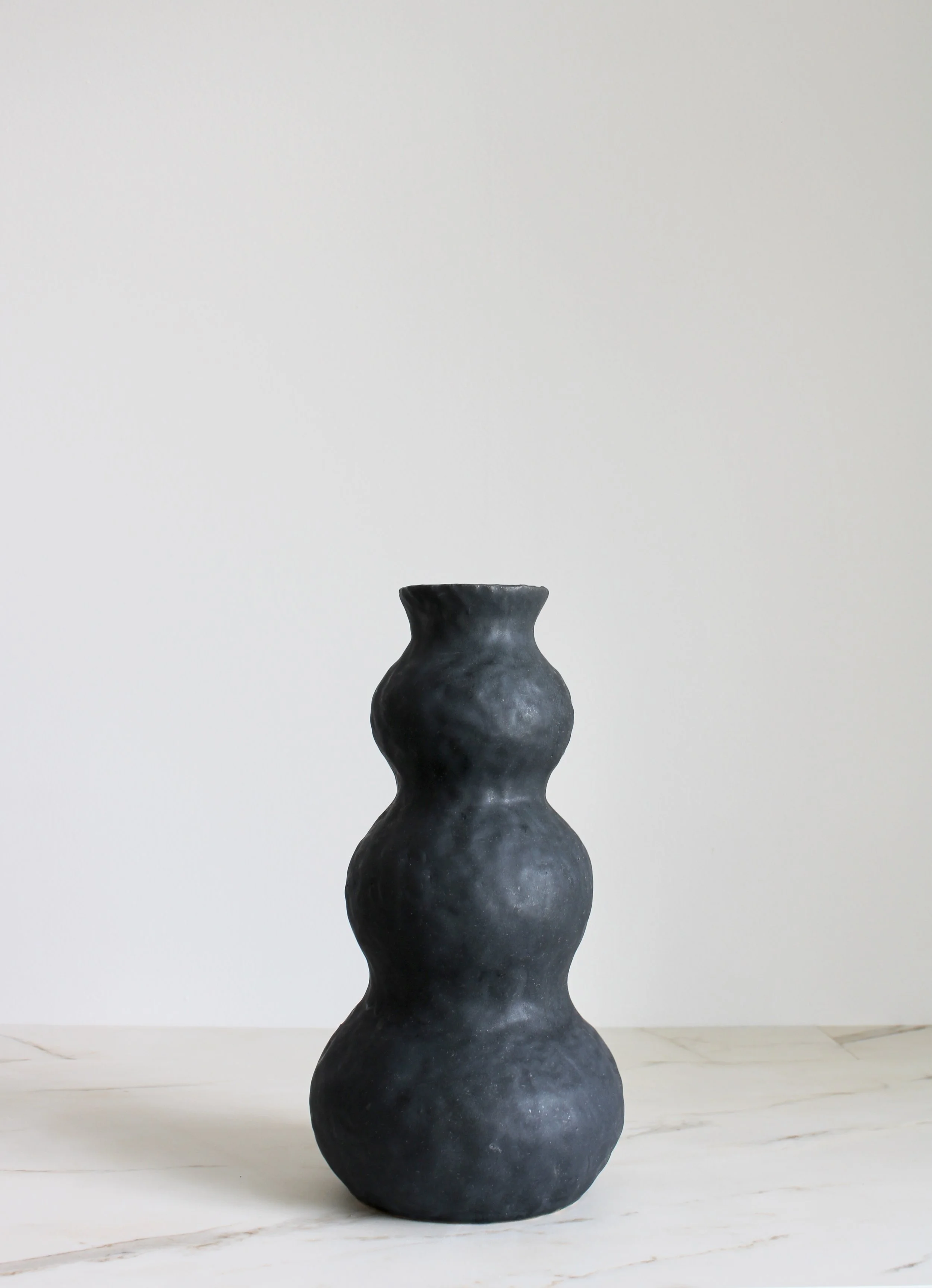 Coal Black Triple Curve