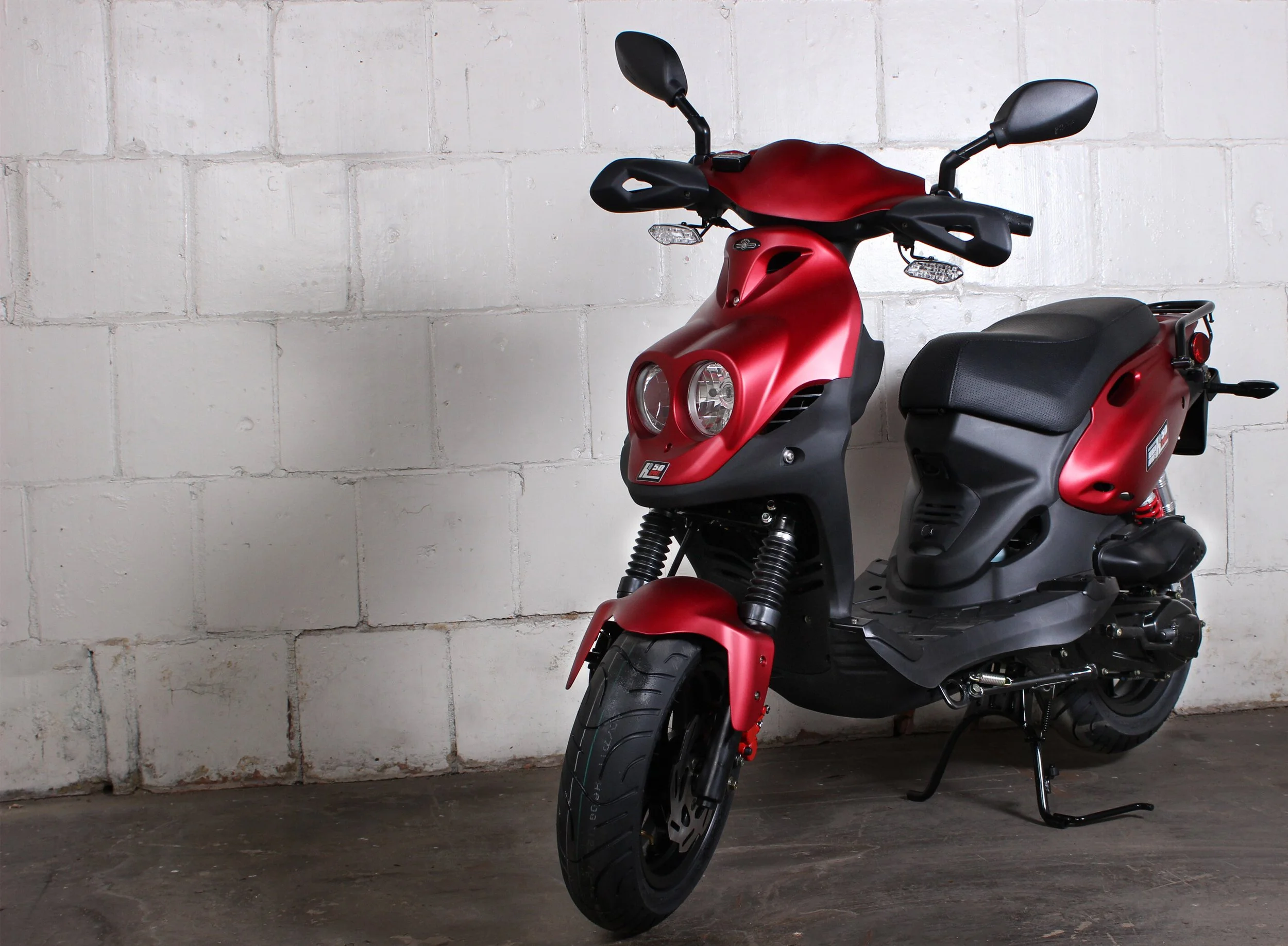 2026 Genuine RoughHouse 50 Sport scooter in Red — close-up styling detail 3