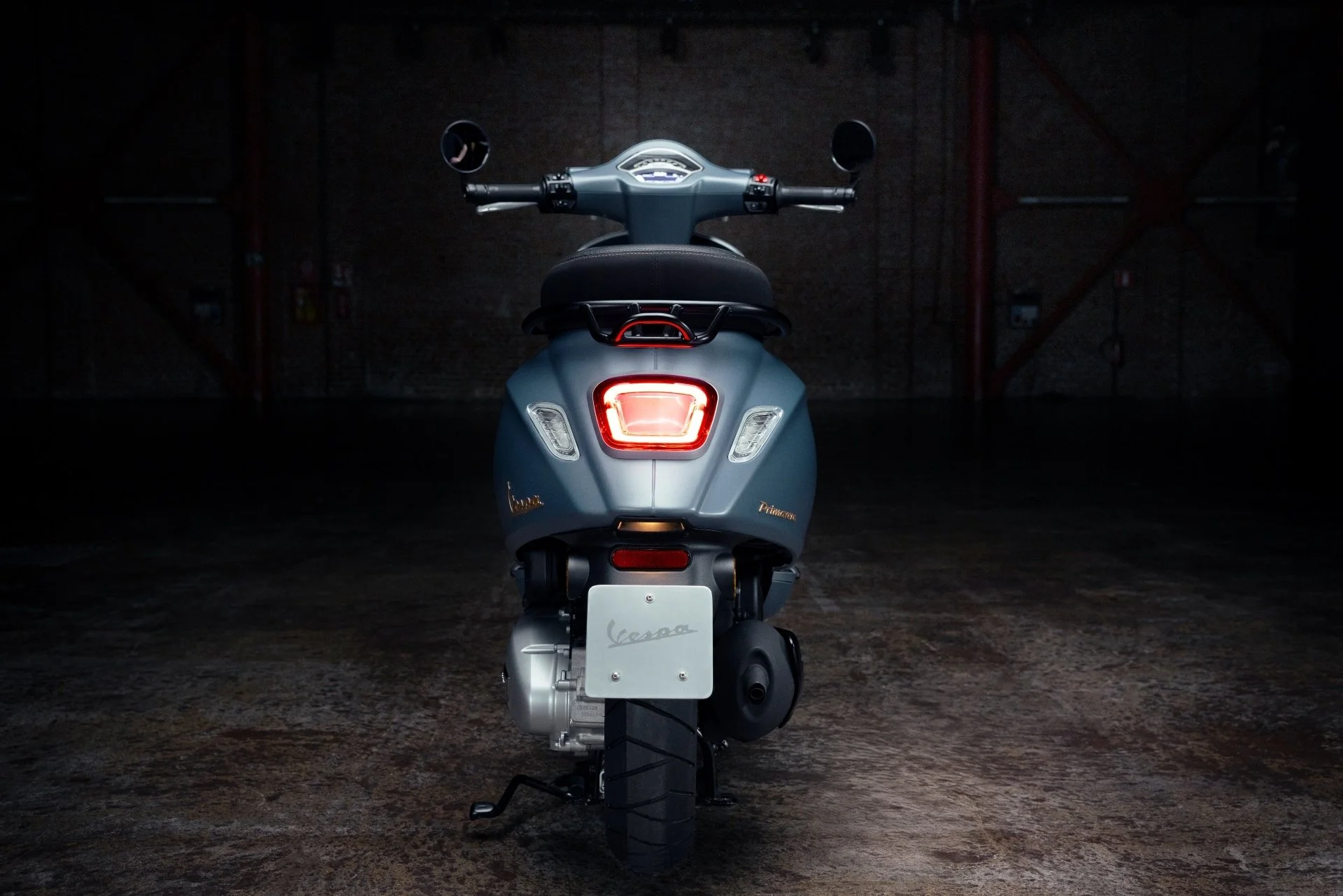 2026 Vespa Primavera 50 scooter — three-quarter rear view 5
