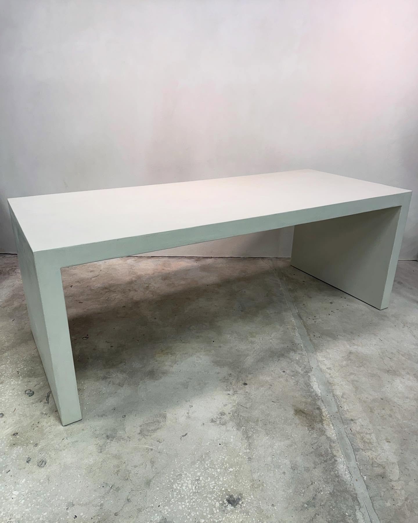 Bar height waterfall table-clean,solid, and made to last #concretetable #diningtable #diningroom #table #customtable #kitchenisland #bartable #waterfalltable #customfurniture #interiordesign #concretedesign #stogsconcretedesign #shipsnationwide