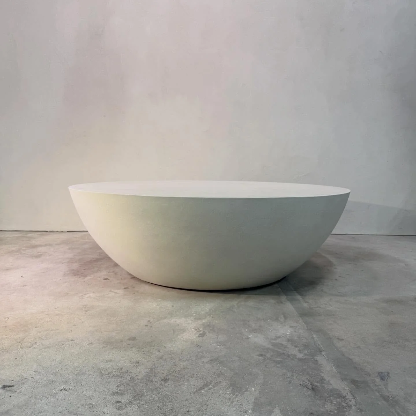 Perfect complement to any living space-our indoor or outdoor round drum coffee table. #coffeetable #concretetable #indooroutdoorliving #interiordesign #stogsconcretedesign