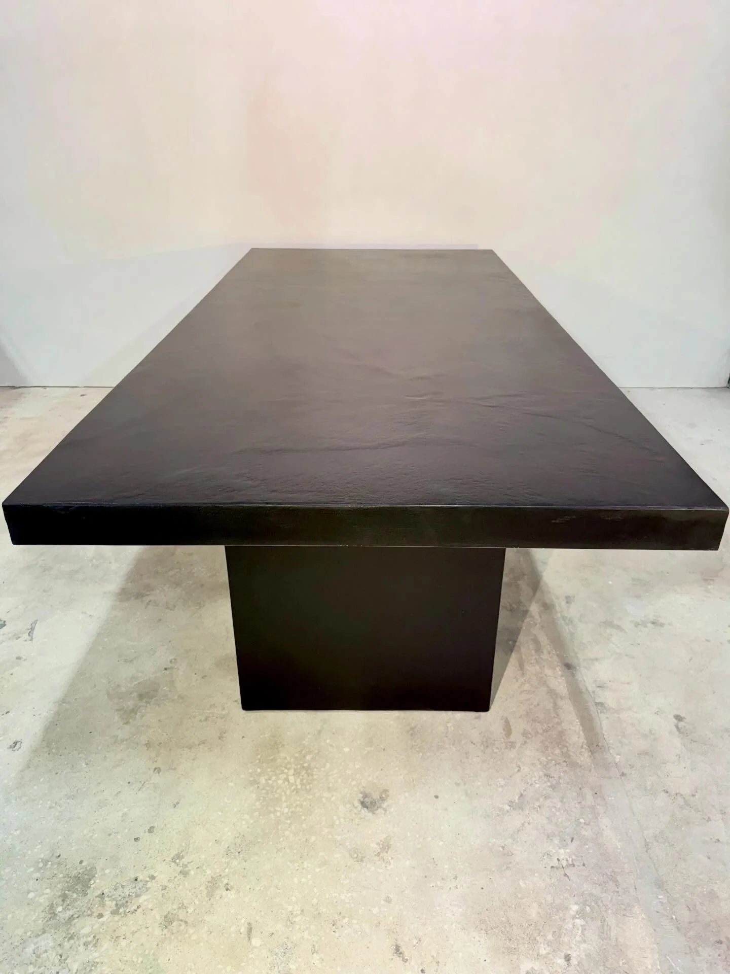 Sleek, timeless and full of character✨ This Slab concrete dining table features our unique hand troweled finish-durable, modern and made to stand out.  #diningtable #concretediningtable #handmade #interiordesign #stogsconcretedesign