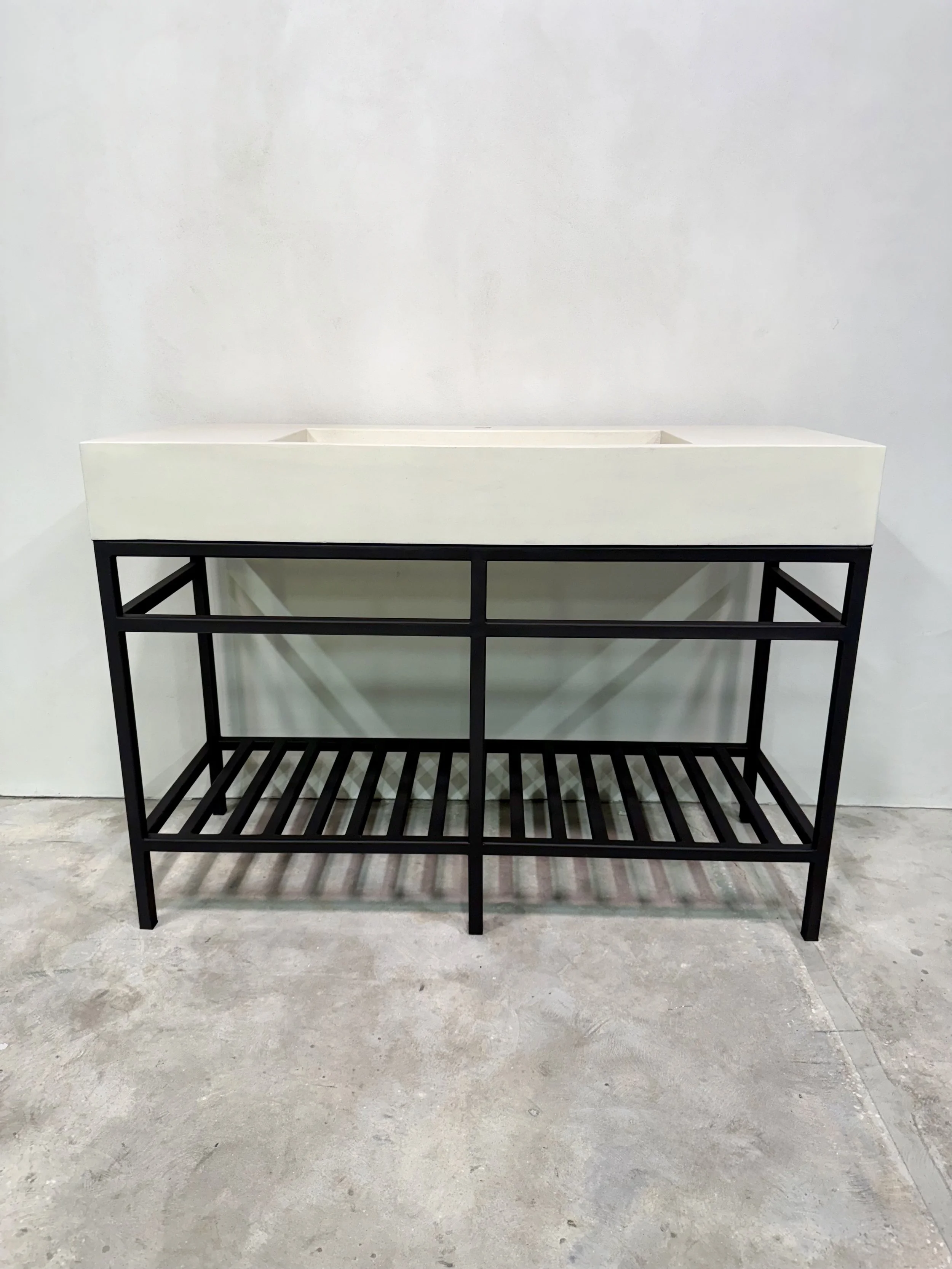 Concrete Ramp Vanity On a Steel Base.jpeg