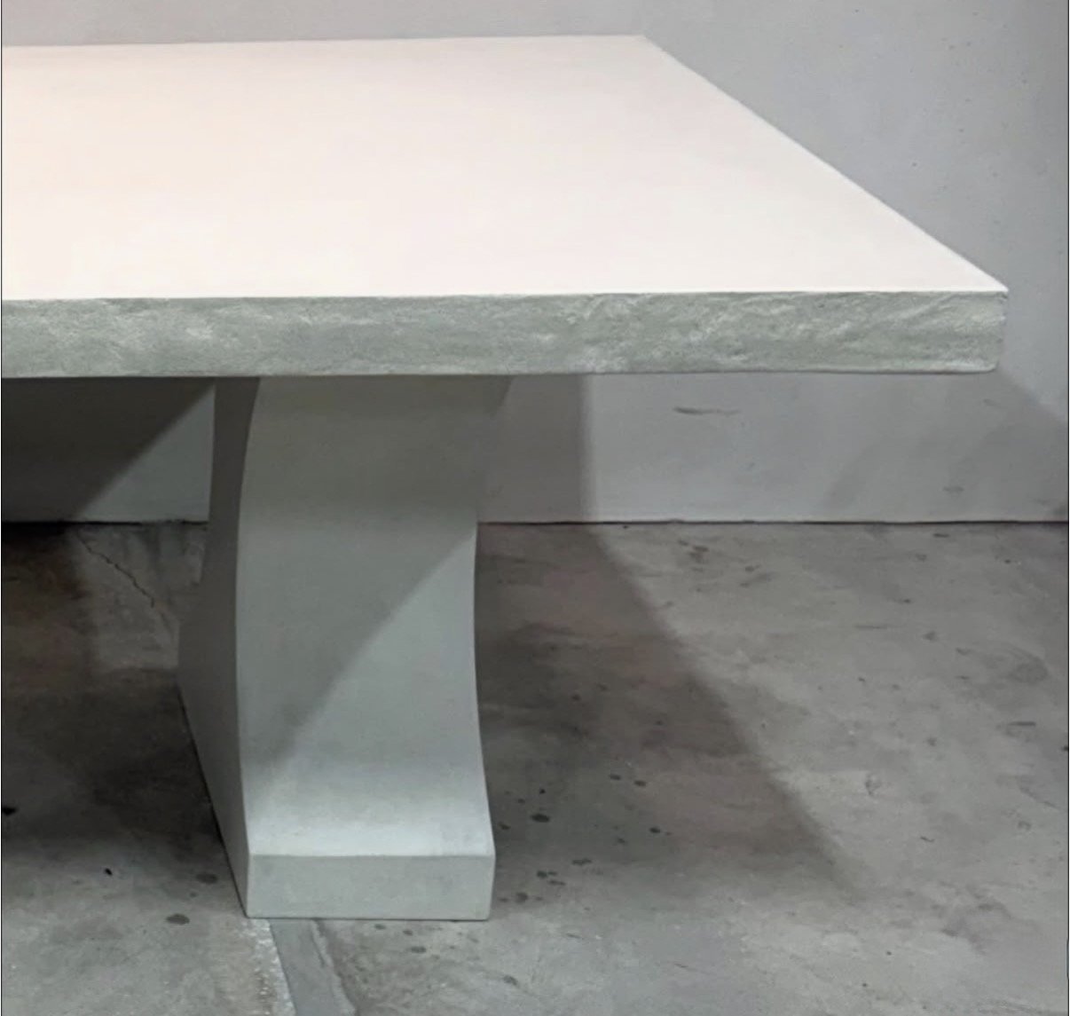 TRESTLE CONCRETE DINING TABLE EDGE.jpg