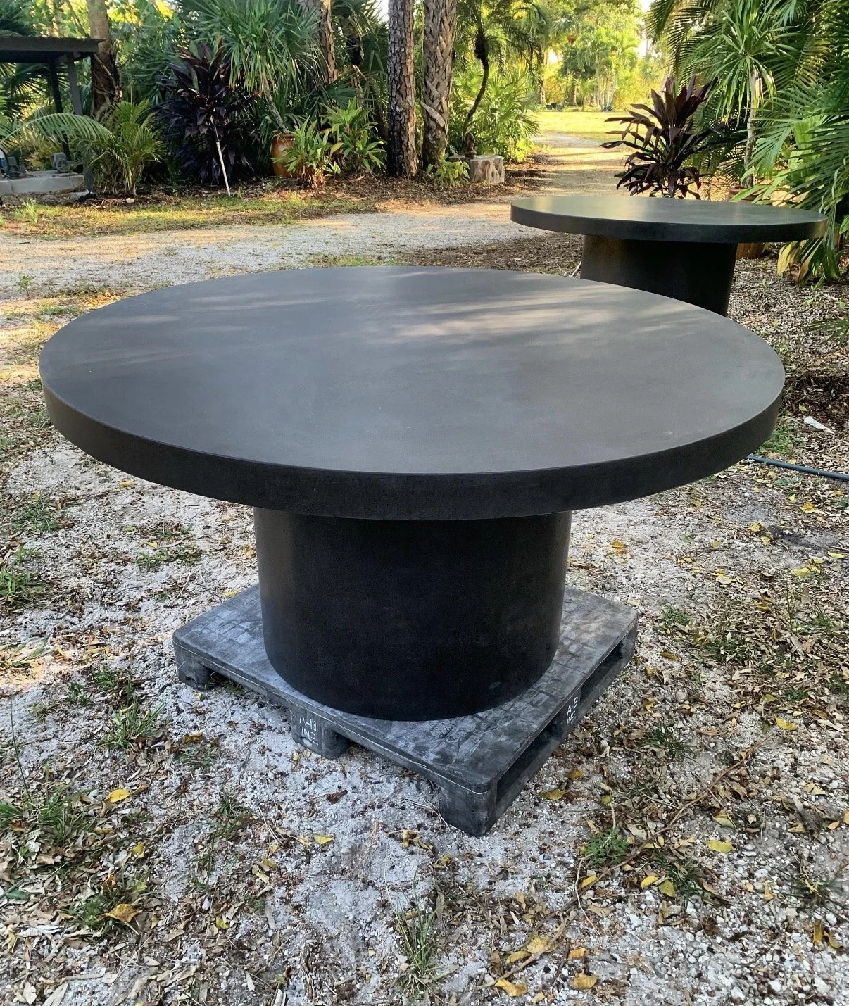 ROUND CONCRETE DINING TABLES BRONZE.jpg
