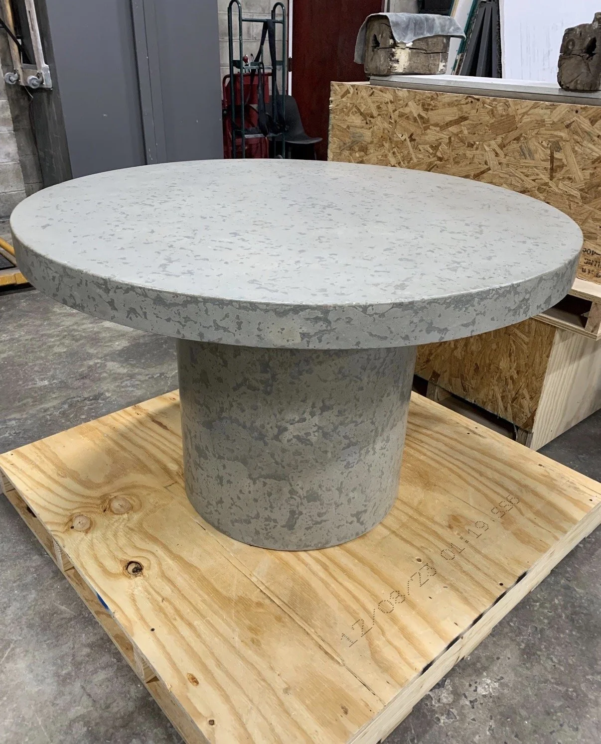 ROUND CONCRETE DINING TABLE HAND PACKED.jpg