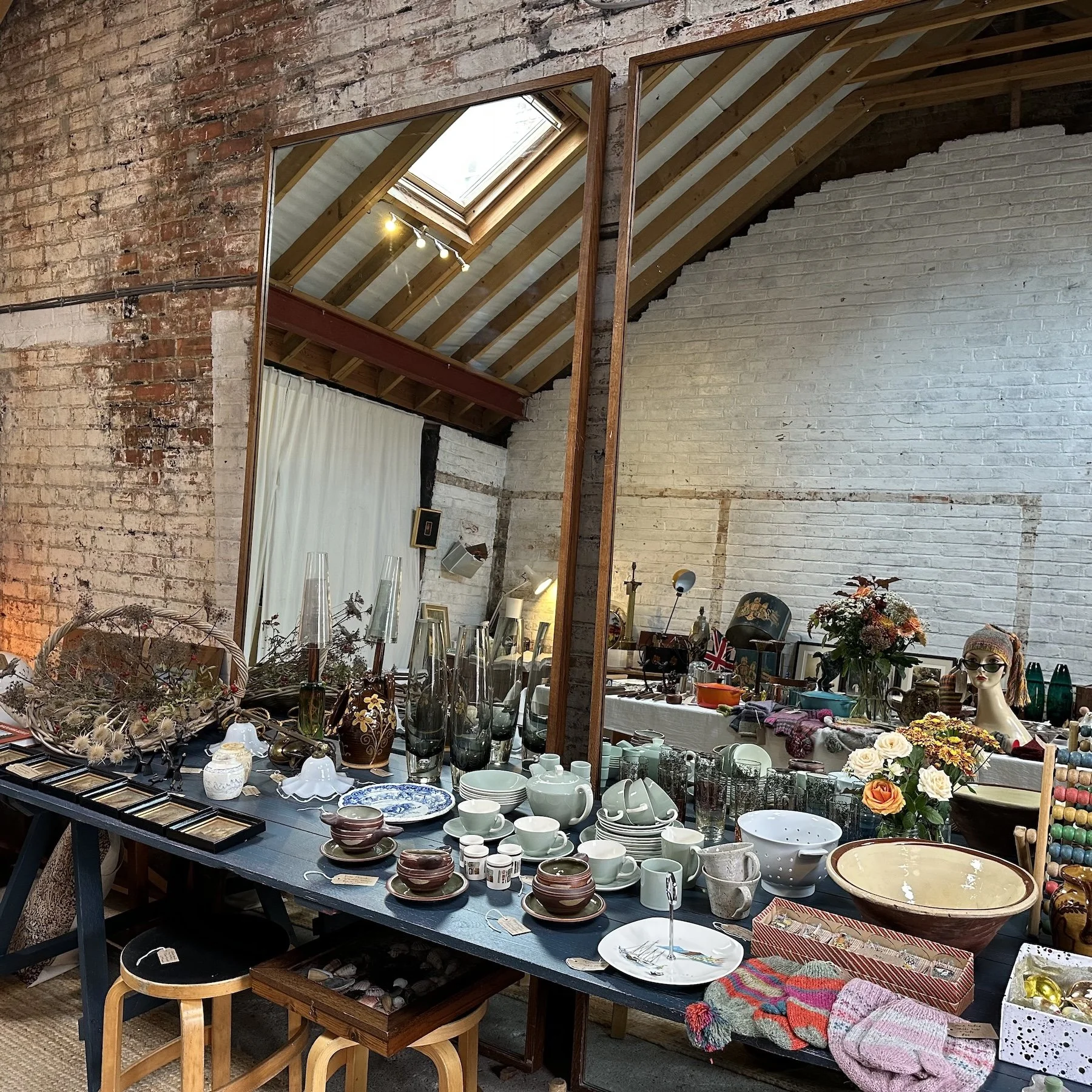 my workshop hoard—an eclectic, characterful collection of Mid-Century furniture, antique curiosities, contemporary art, and sculptural lighting.