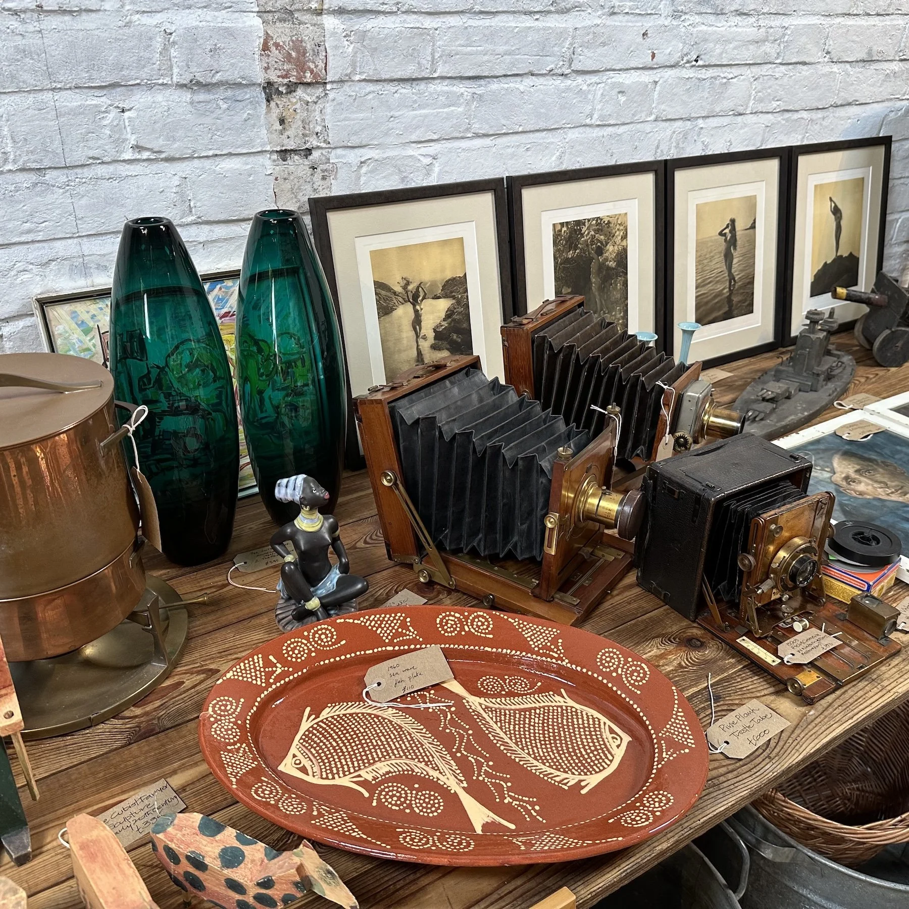 my workshop hoard—an eclectic, characterful collection of Mid-Century furniture, antique curiosities, contemporary art, and sculptural lighting.
